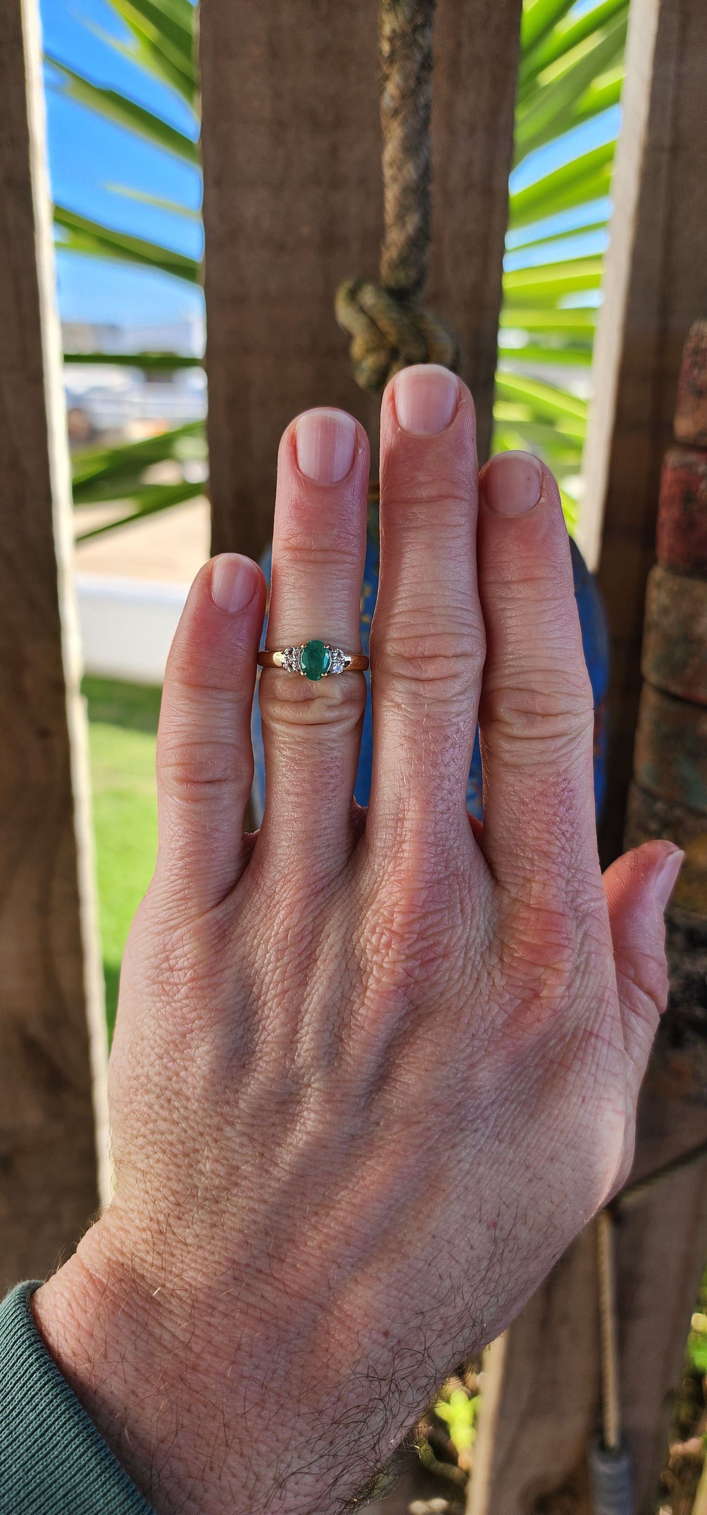 "Emerald Glow" – Emerald & White Topaz Trilogy Ring.