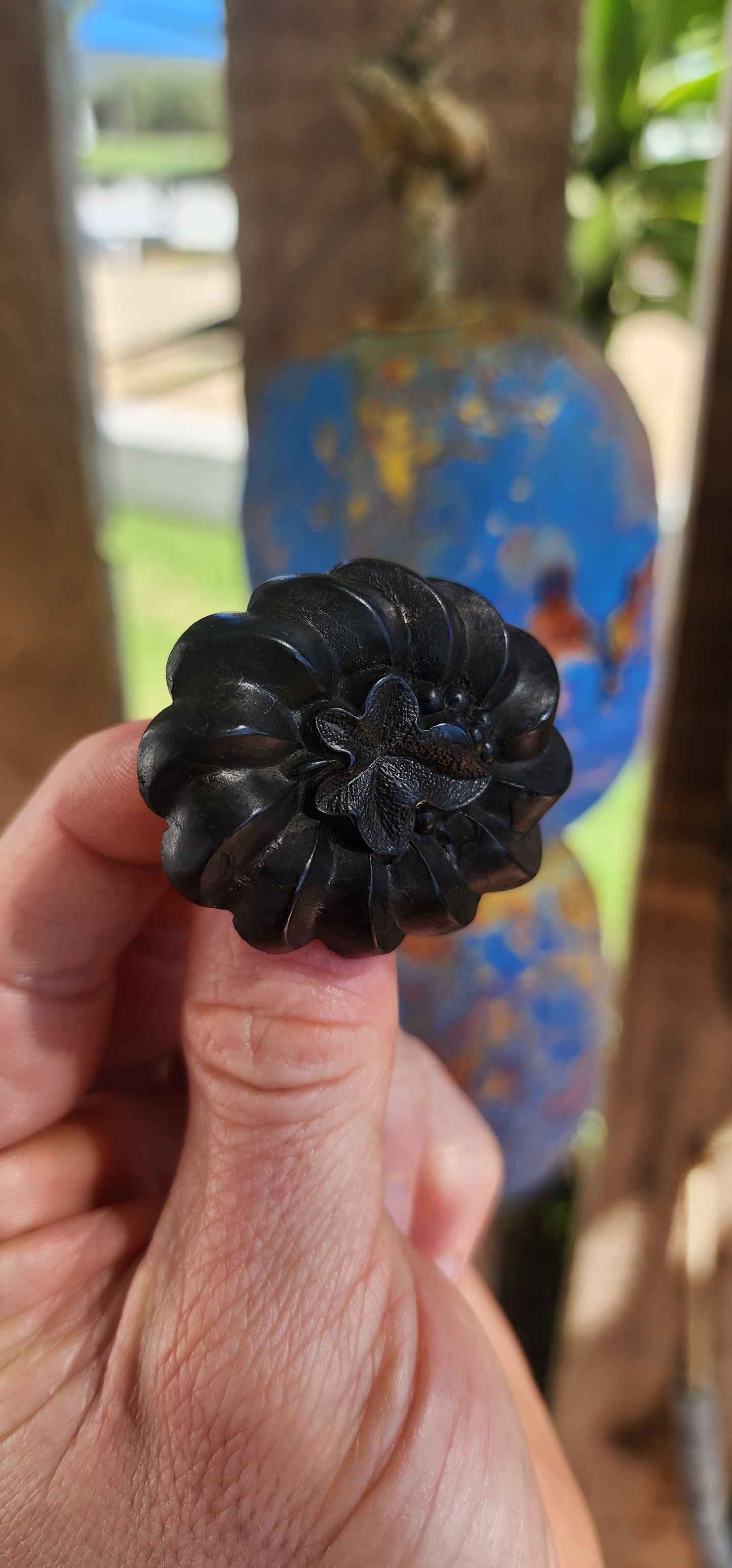 This is a rare antique Victorian mourning brooch, hand-carved from Irish bog oak, dating to the late 19th century, circa 1880s.