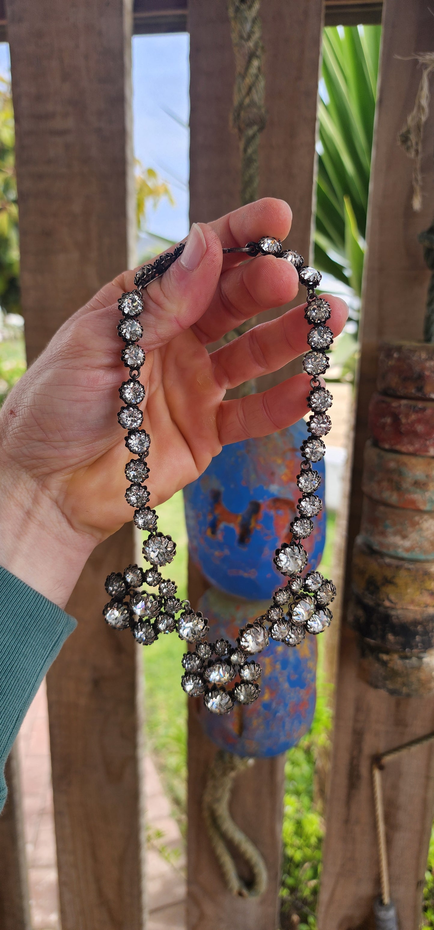 This spectacular and chunky 1960s French vintage costume choker necklace is a showstopper from every angle! Expertly crafted in silvertone metal, the entire necklace is encrusted with sparkly clear foiled-back paste glass rhinestones.