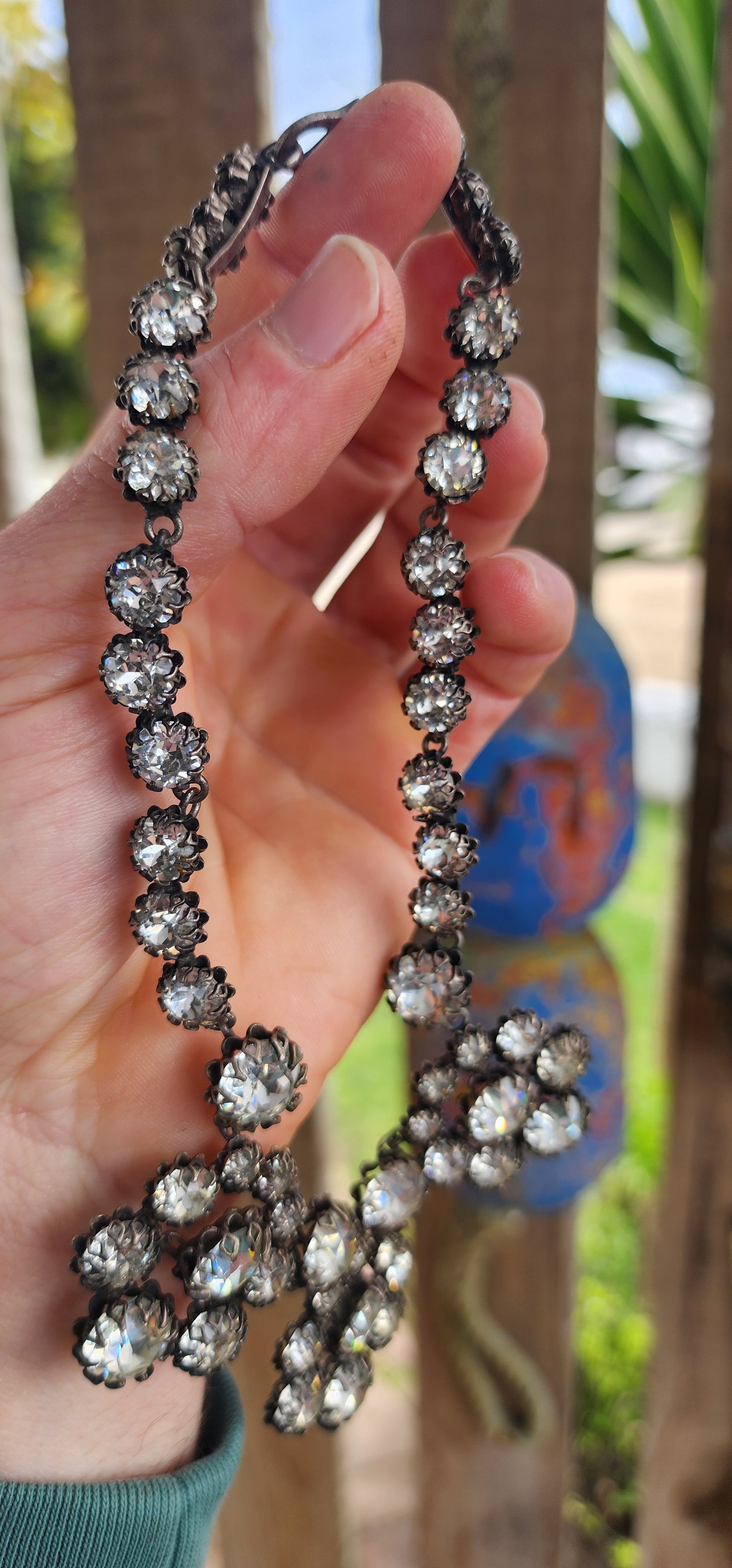 This spectacular and chunky 1960s French vintage costume choker necklace is a showstopper from every angle! Expertly crafted in silvertone metal, the entire necklace is encrusted with sparkly clear foiled-back paste glass rhinestones.
