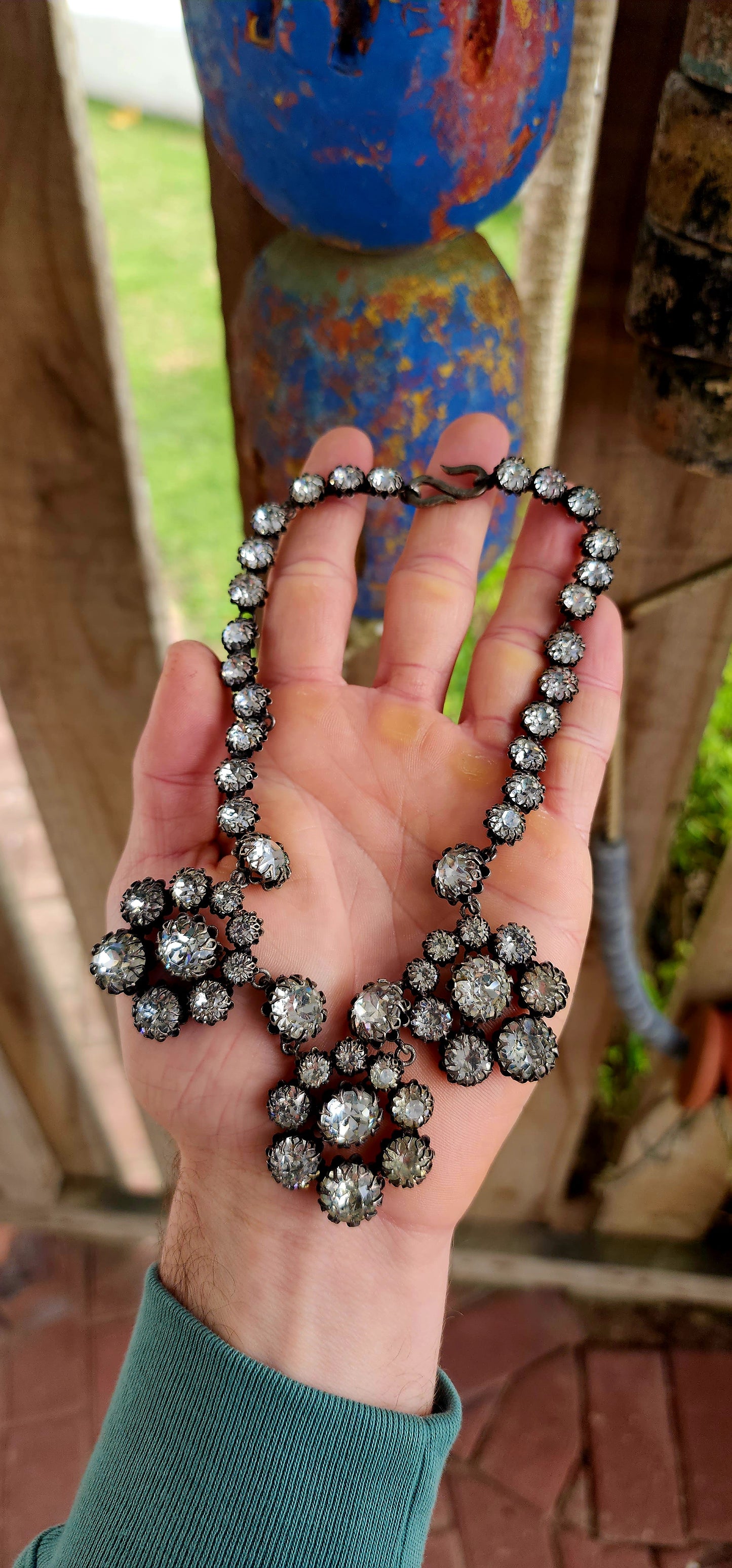 This spectacular and chunky 1960s French vintage costume choker necklace is a showstopper from every angle! Expertly crafted in silvertone metal, the entire necklace is encrusted with sparkly clear foiled-back paste glass rhinestones.