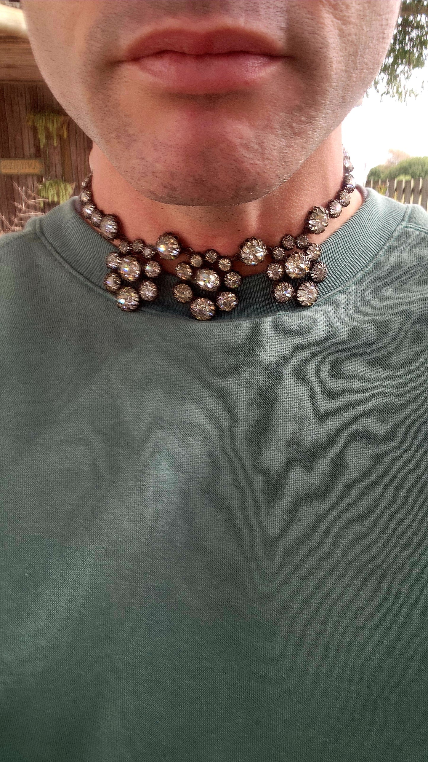 This spectacular and chunky 1960s French vintage costume choker necklace is a showstopper from every angle! Expertly crafted in silvertone metal, the entire necklace is encrusted with sparkly clear foiled-back paste glass rhinestones.