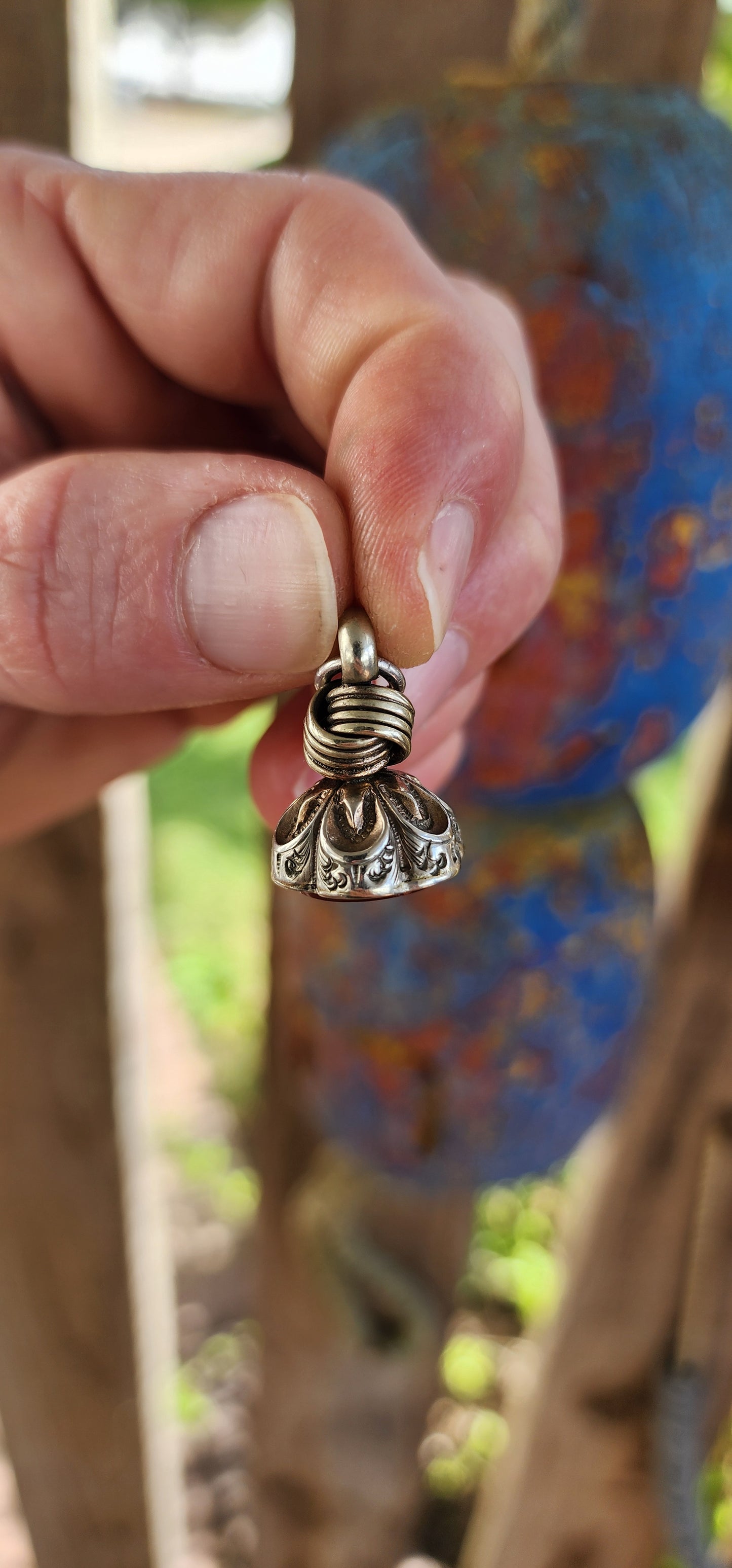 Antique Victorian era silver-plated fob seal pendant.
Exquisitely crafted, the top features an intricate knot design — often interpreted as a symbol of unity, continuity, and eternal bonds.