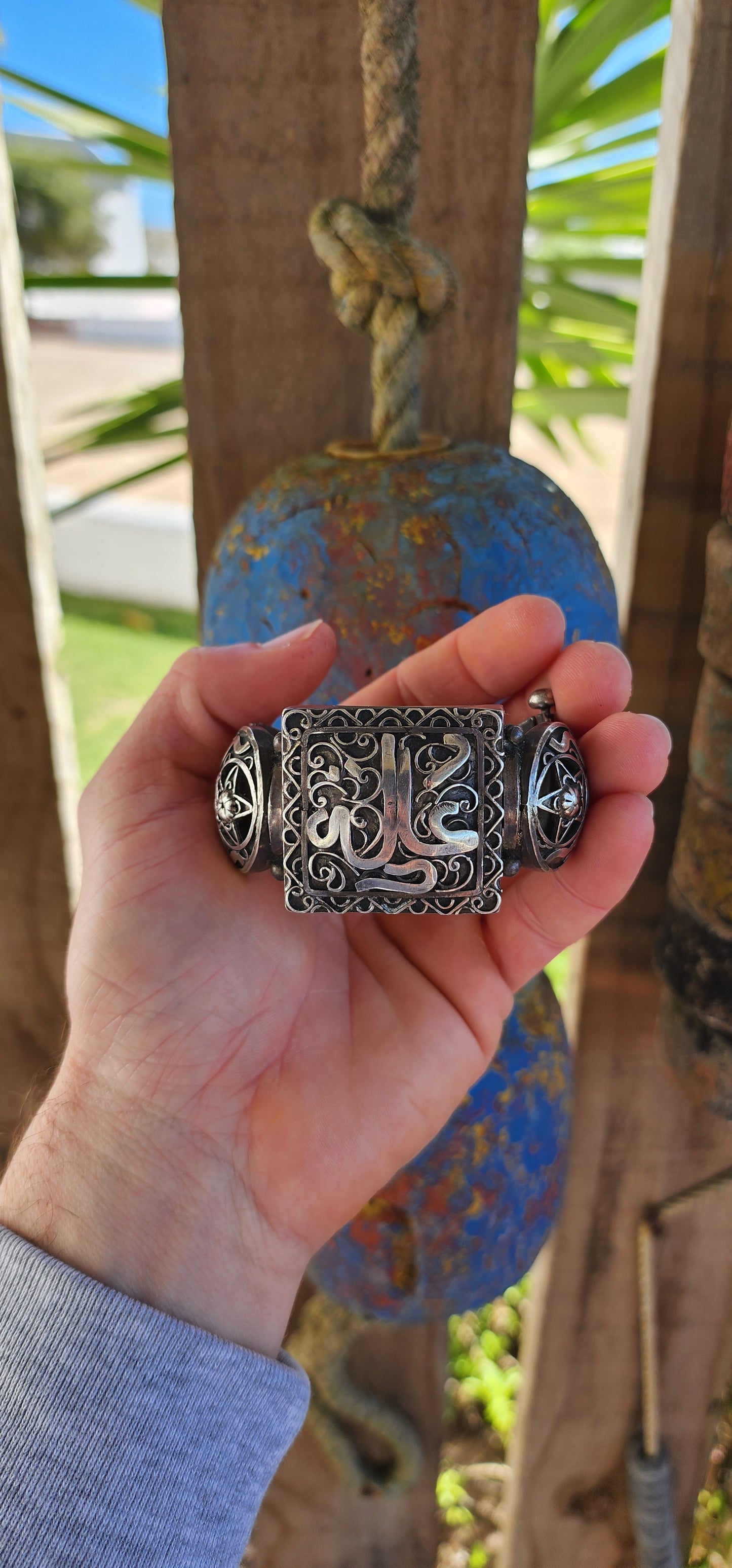 Striking antique hinged bangle, crafted in solid 800 silver with commanding presence and intricate artistry.