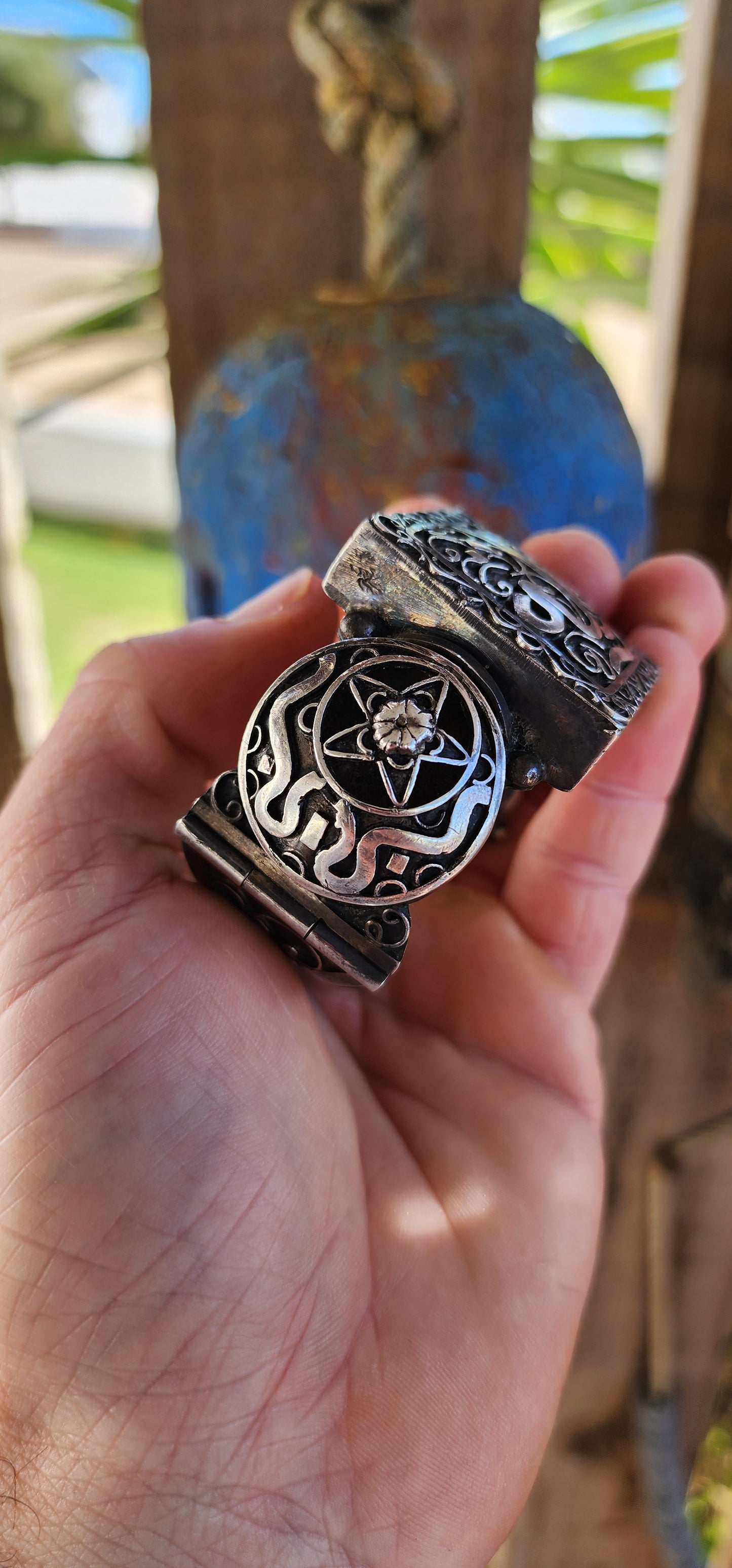 Striking antique hinged bangle, crafted in solid 800 silver with commanding presence and intricate artistry.