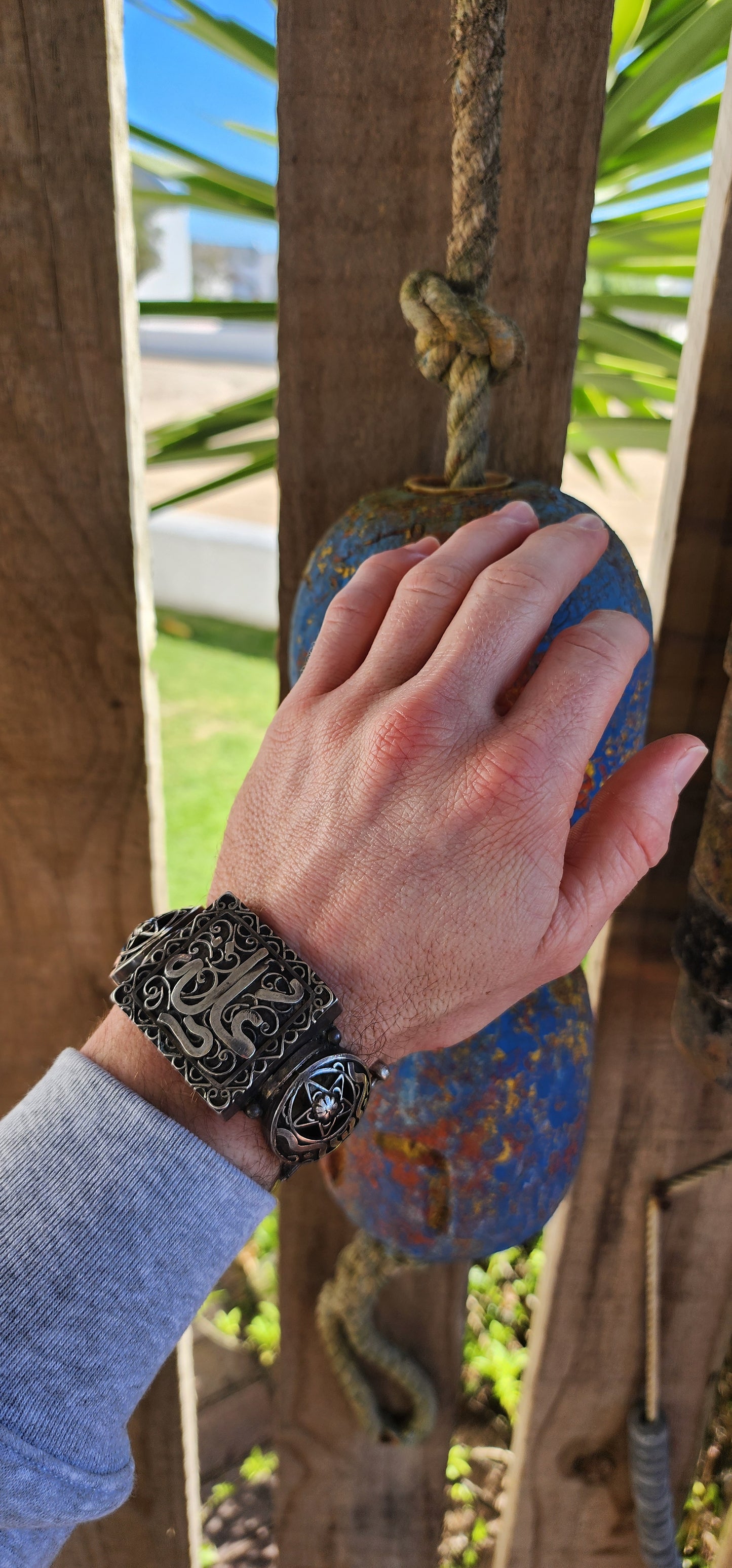 Striking antique hinged bangle, crafted in solid 800 silver with commanding presence and intricate artistry.