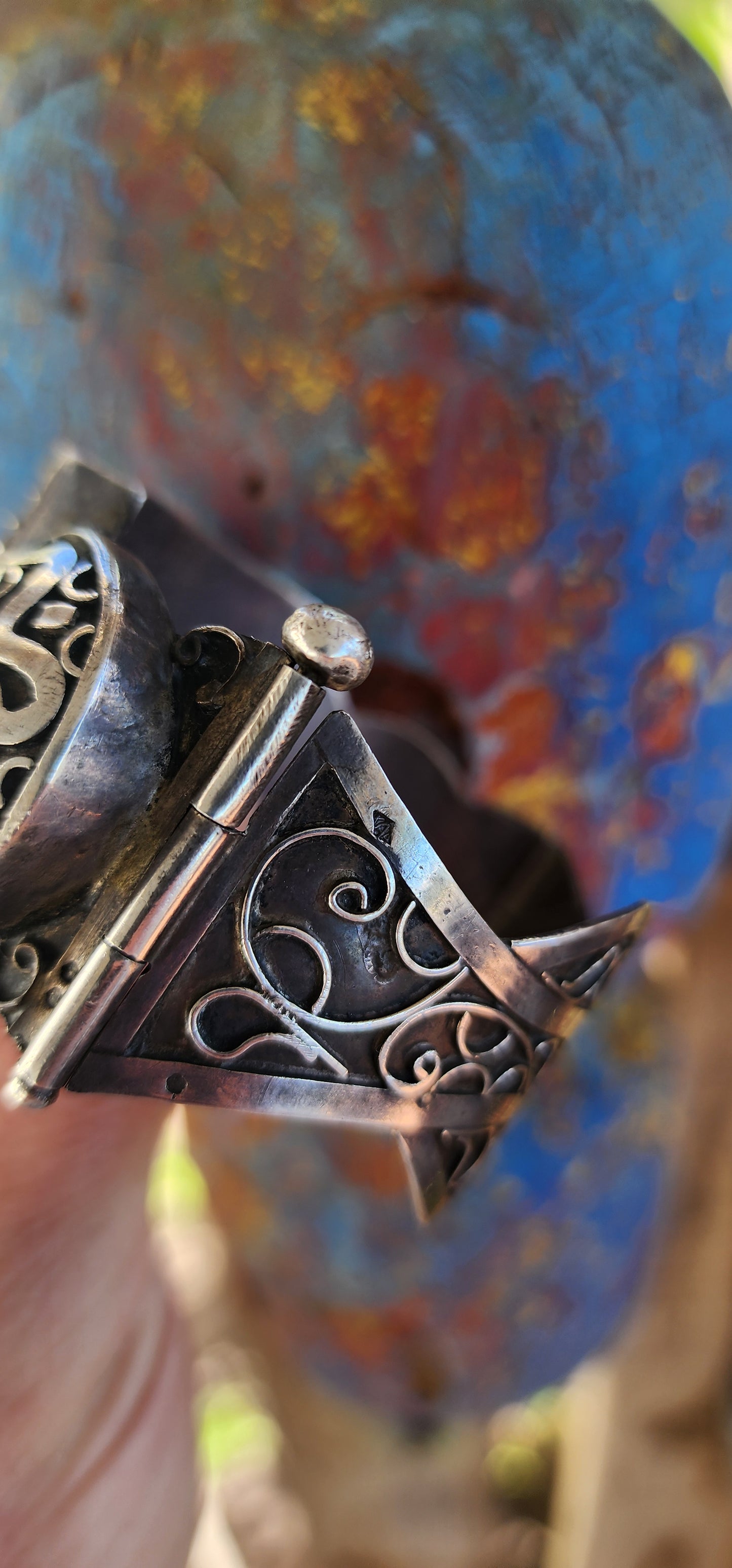 Striking antique hinged bangle, crafted in solid 800 silver with commanding presence and intricate artistry.