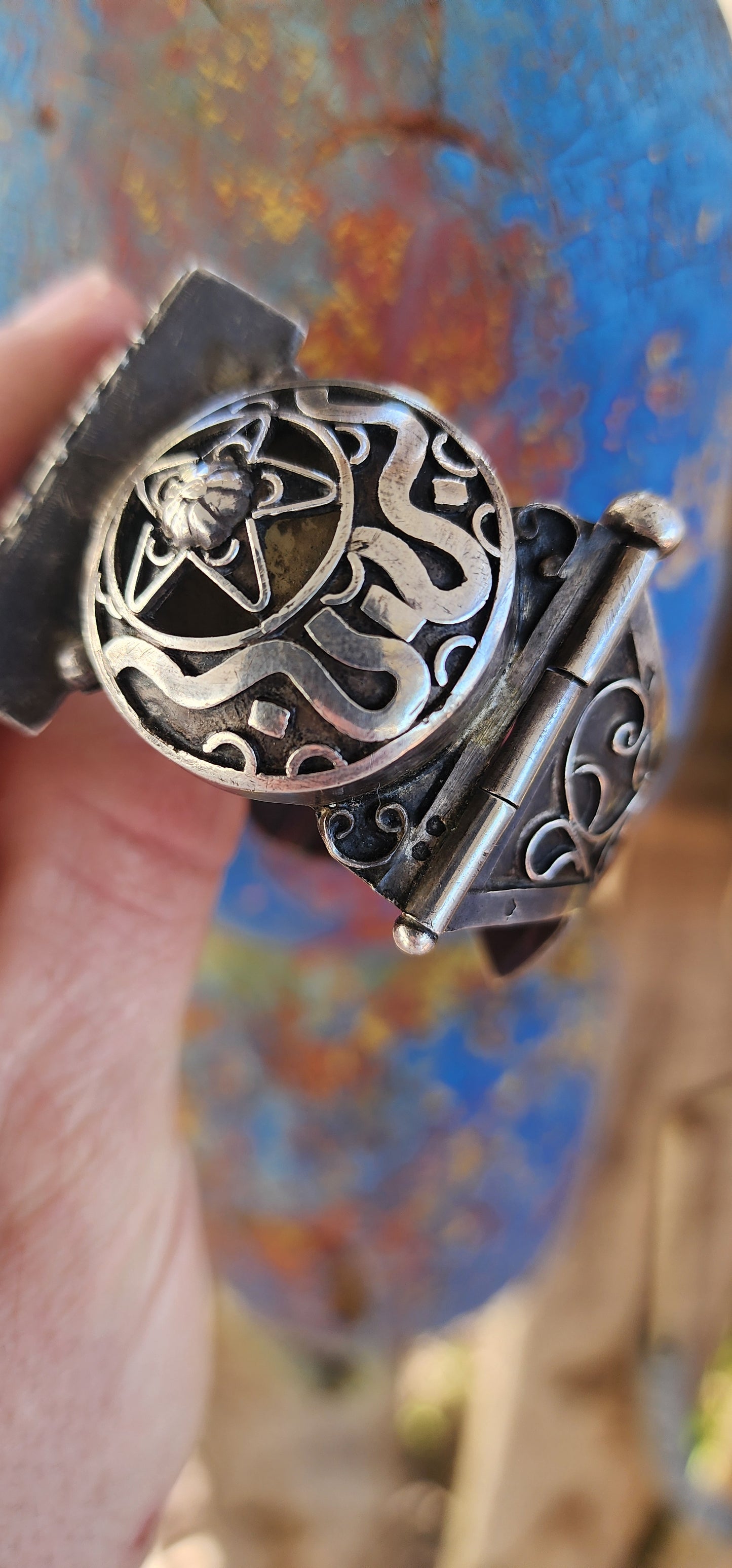 Striking antique hinged bangle, crafted in solid 800 silver with commanding presence and intricate artistry.