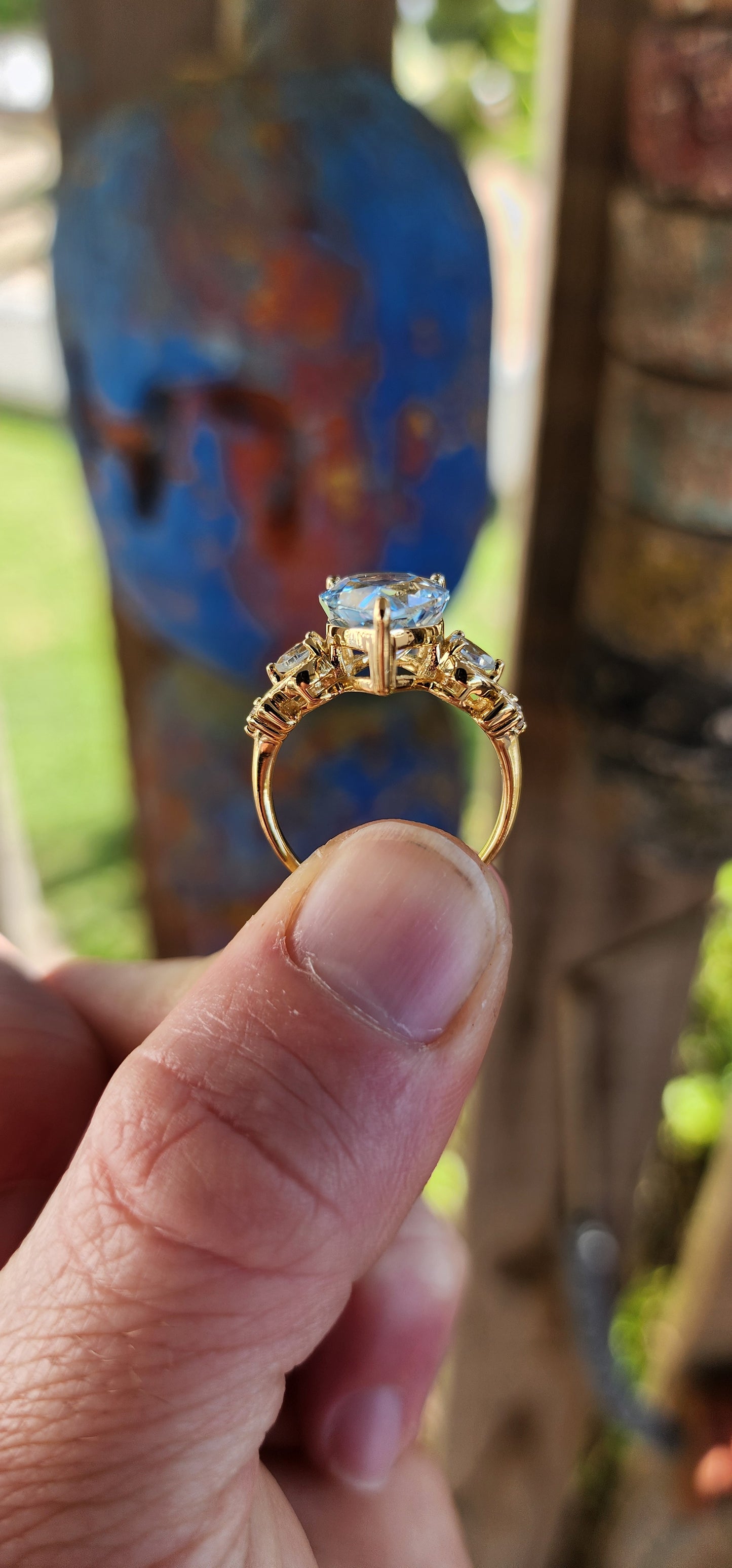 Ocean’s Crown – A Sky Blue Topaz Masterpiece.
Kissed by the ocean’s breath and wrapped in golden sunlight—this ring looks as though it was plucked from the treasure chest of a sea-born queen.