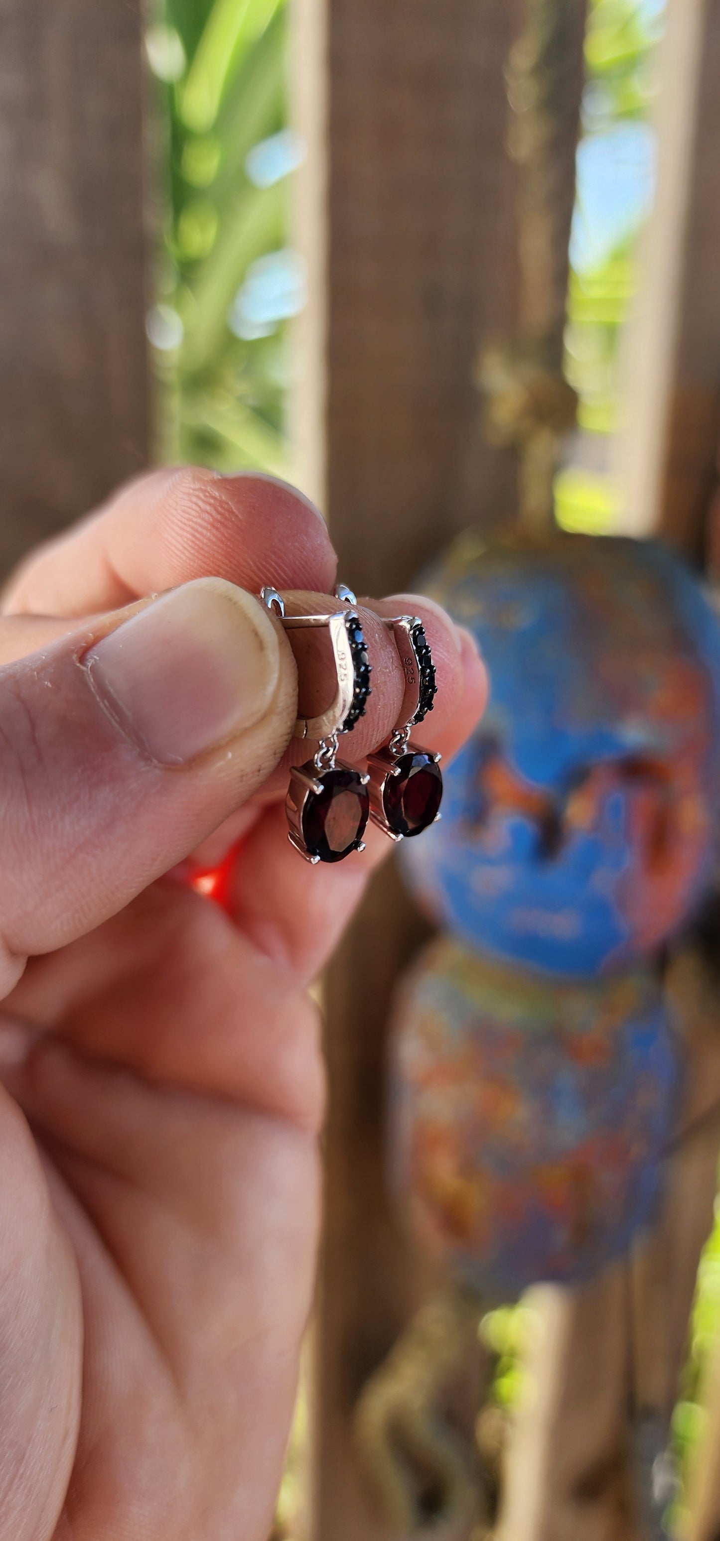 Crafted in gleaming 925 silver, each earring begins with a sleek line of round-cut black spinel gemstones, pavé-set to perfection. Their inky sparkle adds an irresistible edge, like midnight stars twinkling against the night sky.