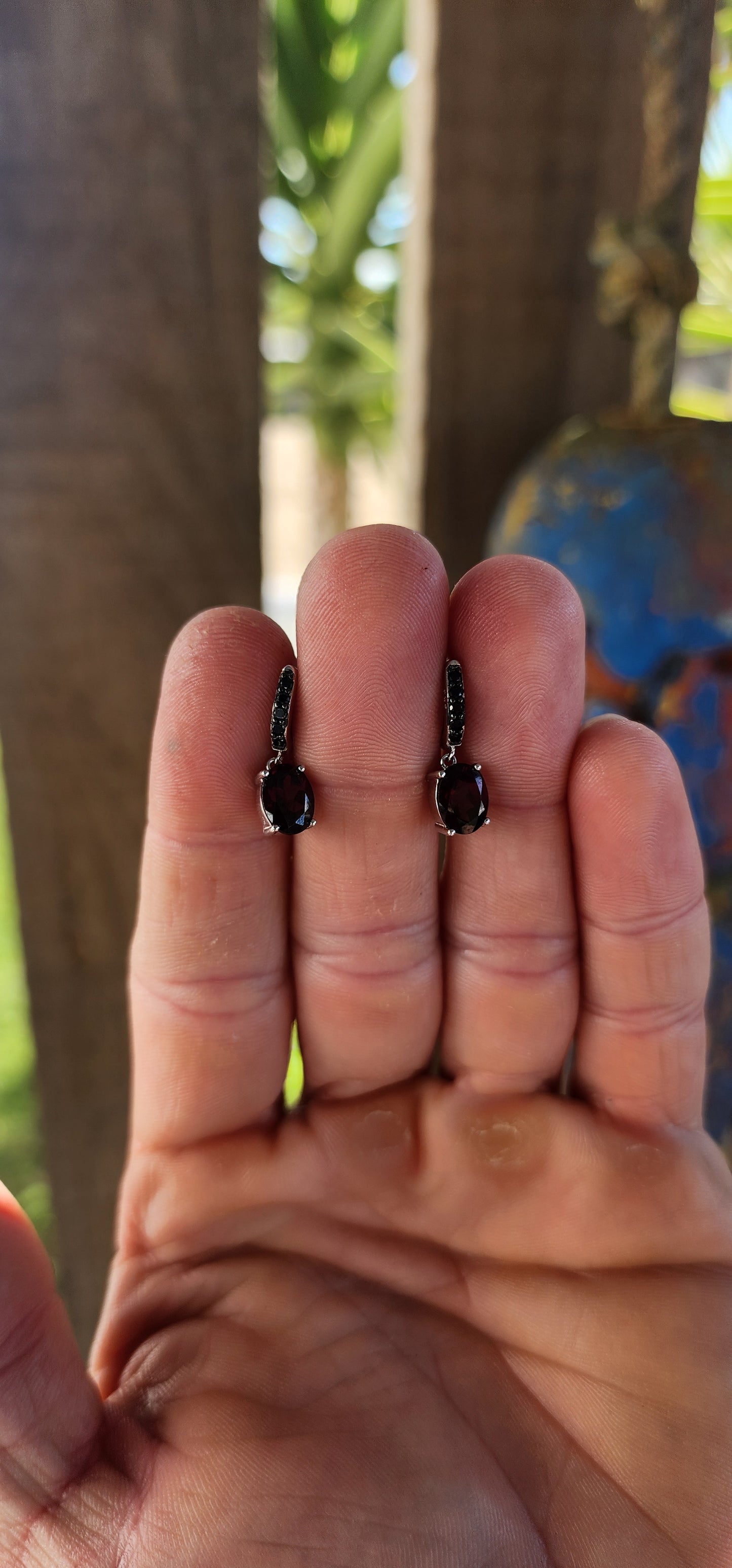 Crafted in gleaming 925 silver, each earring begins with a sleek line of round-cut black spinel gemstones, pavé-set to perfection. Their inky sparkle adds an irresistible edge, like midnight stars twinkling against the night sky.