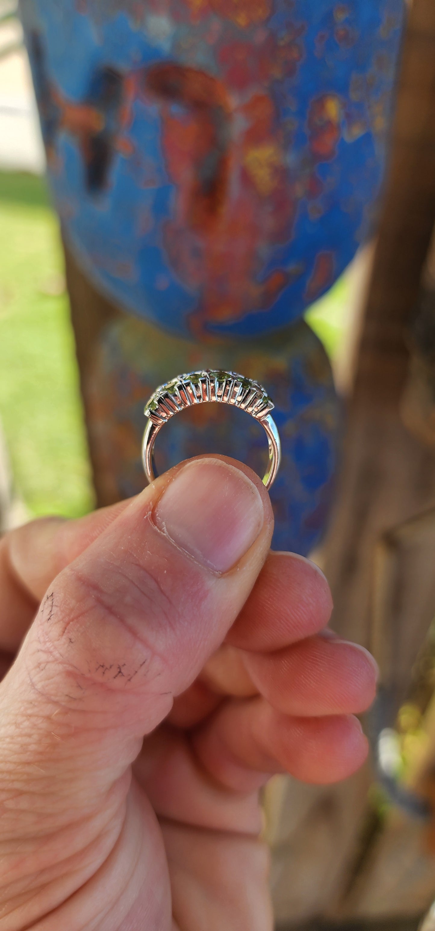 This chunky unisex half-eternity style ring is crafted in sterling silver and finished with a protective layer of rhodium plating for a bright, tarnish-resistant sparkle.