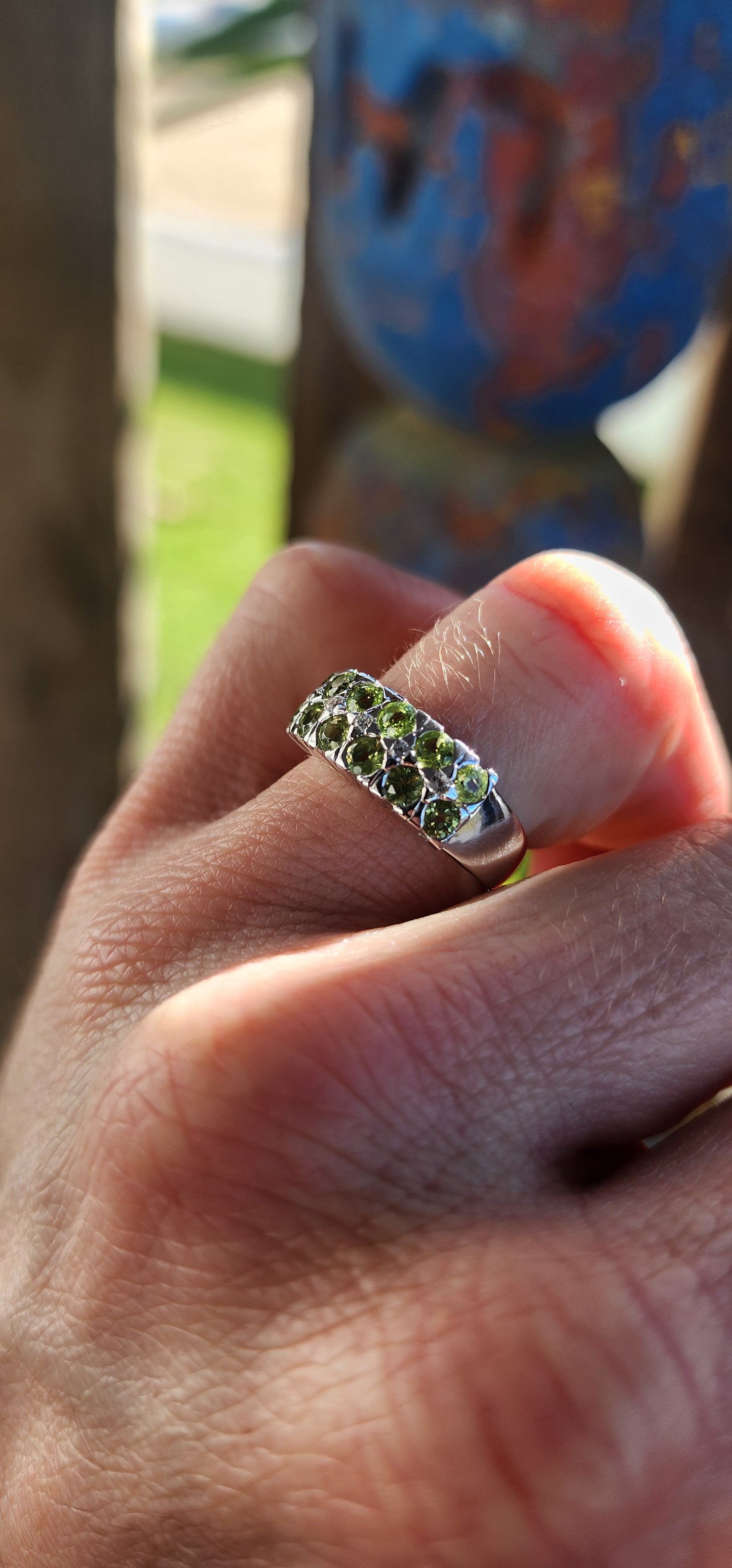 This chunky unisex half-eternity style ring is crafted in sterling silver and finished with a protective layer of rhodium plating for a bright, tarnish-resistant sparkle.