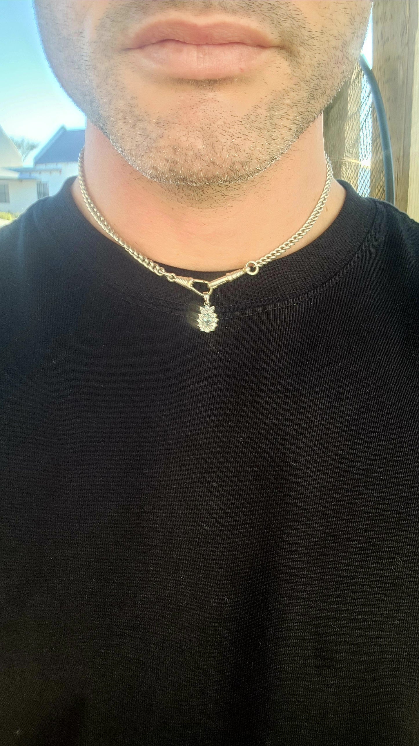 An enchanting treasure of elegance – this sterling silver and aquamarine floral halo pendant perfectly captures the essence of grace.