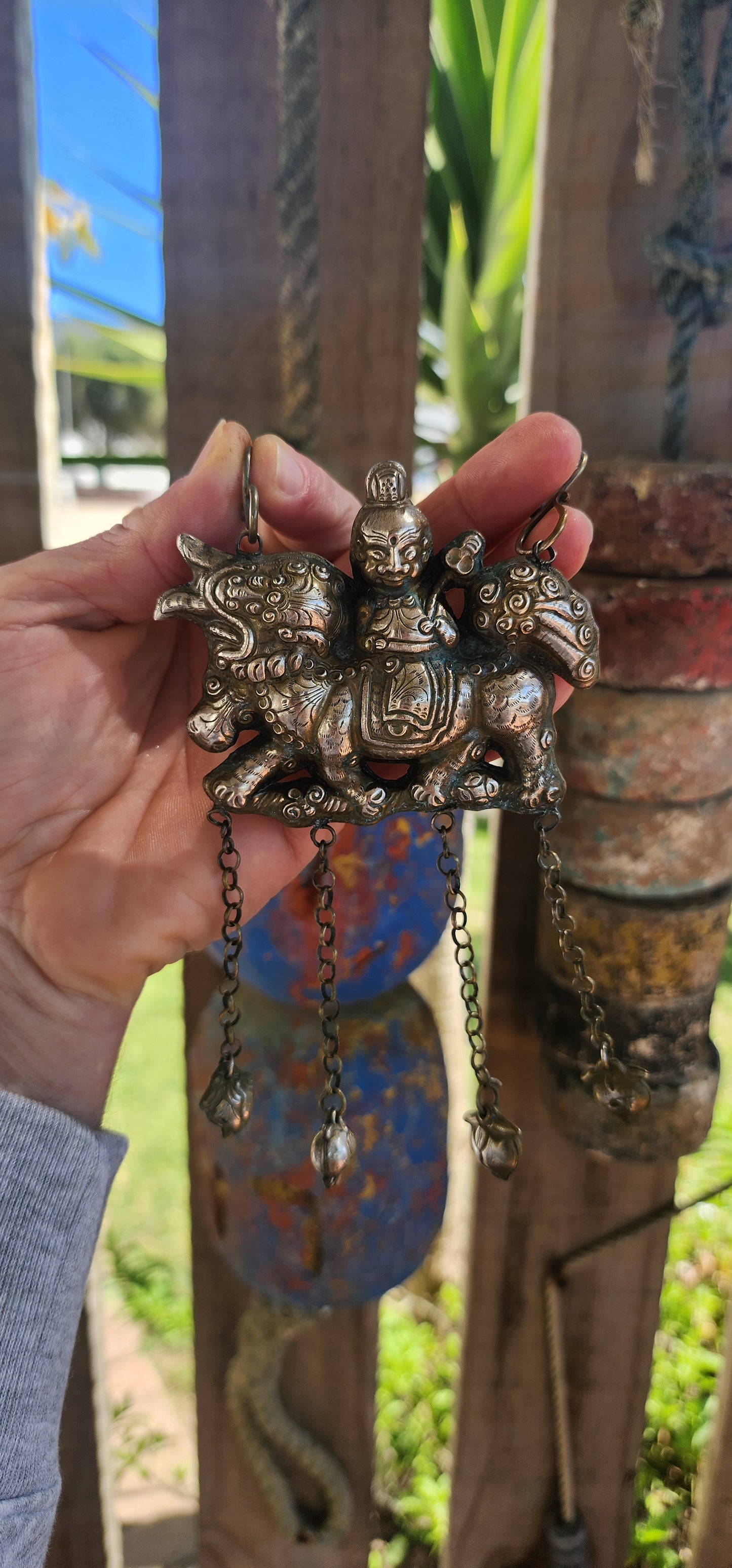 Oversized Antique Chinese Silvertone Pendant Depicting a Warrior on a Qilin with Longevity Charms.