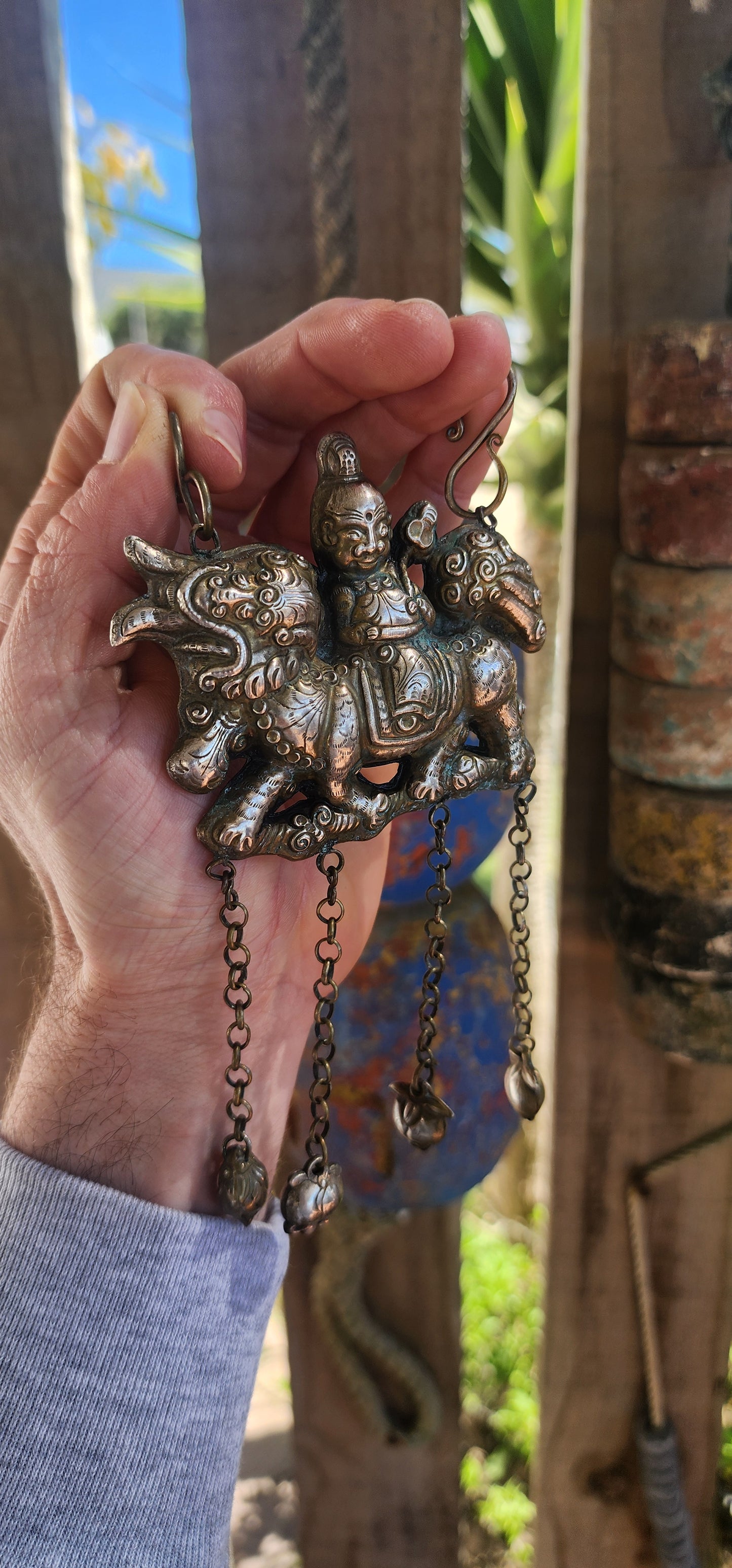 Oversized Antique Chinese Silvertone Pendant Depicting a Warrior on a Qilin with Longevity Charms.