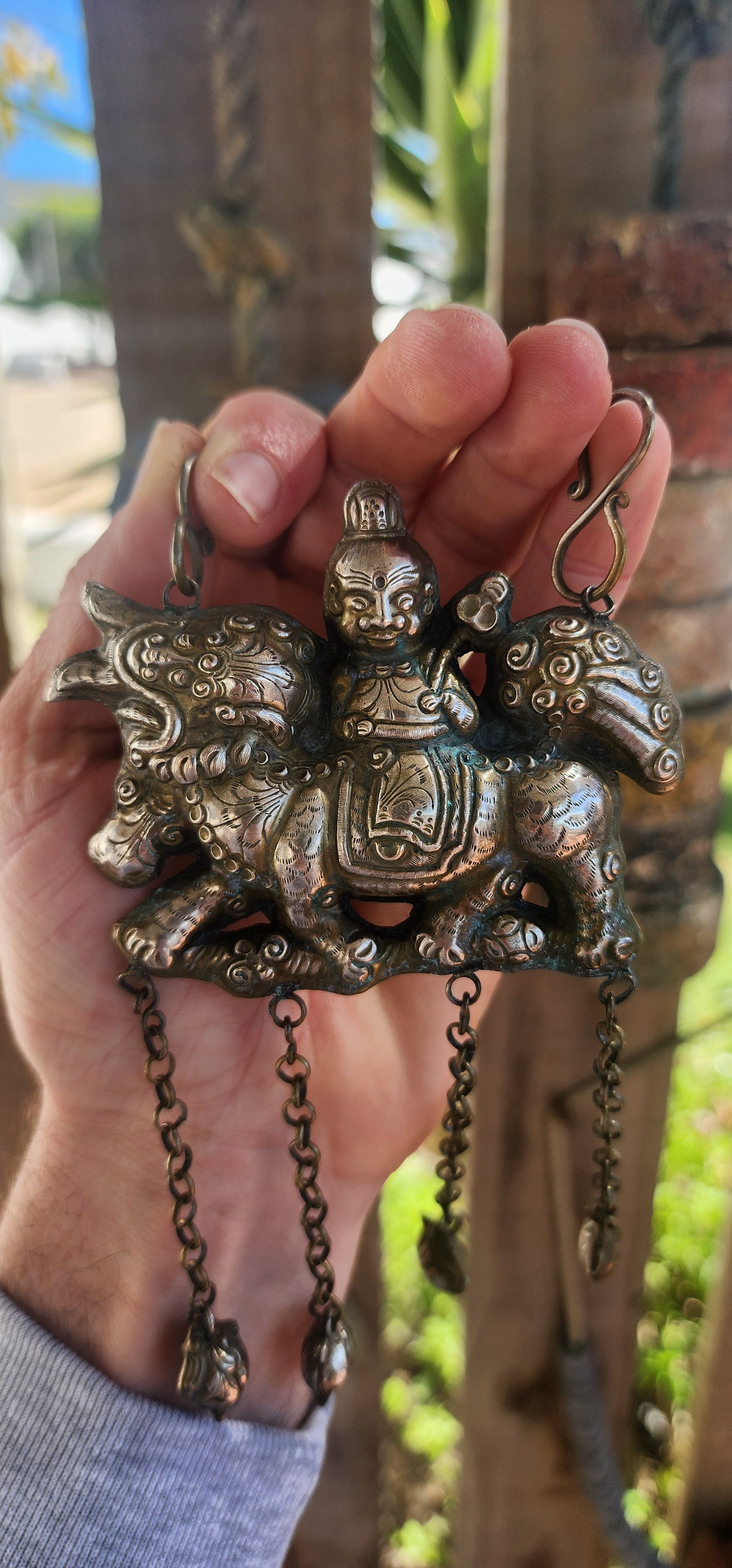 Oversized Antique Chinese Silvertone Pendant Depicting a Warrior on a Qilin with Longevity Charms.
