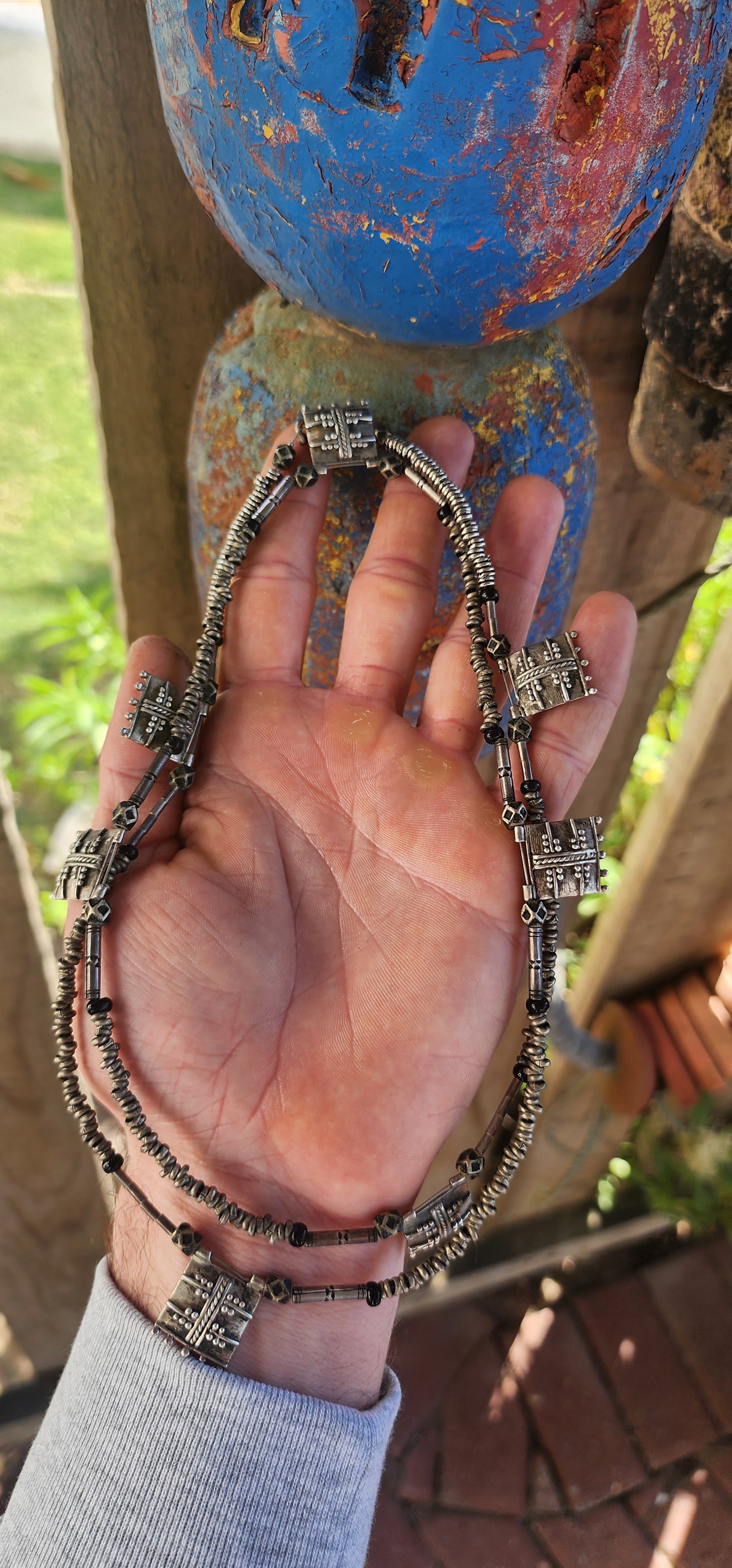 A marvelous and authentic piece of ethnic Ethiopian jewelry, this extra-length necklace embodies both adornment and tradition.