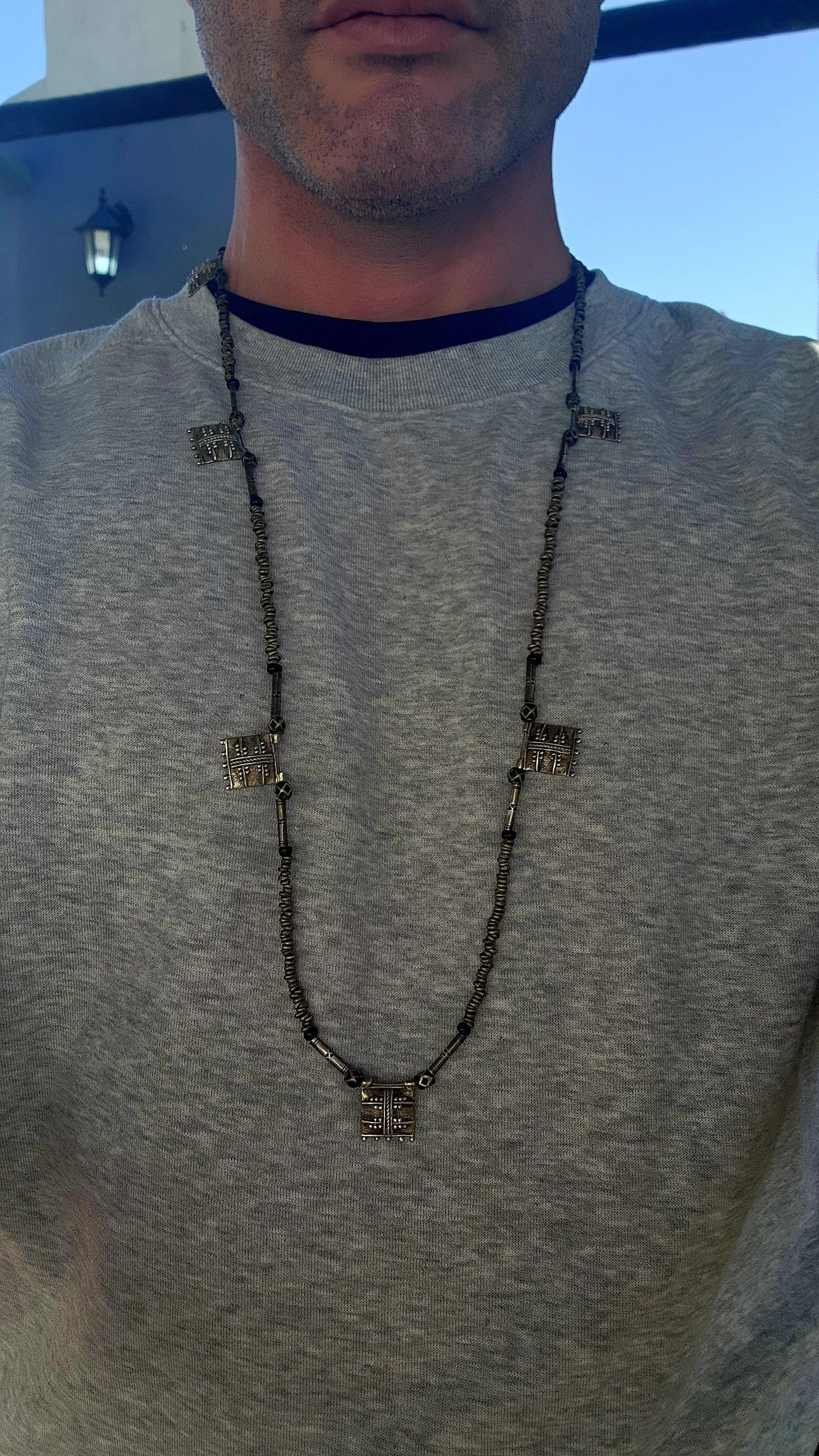 A marvelous and authentic piece of ethnic Ethiopian jewelry, this extra-length necklace embodies both adornment and tradition.