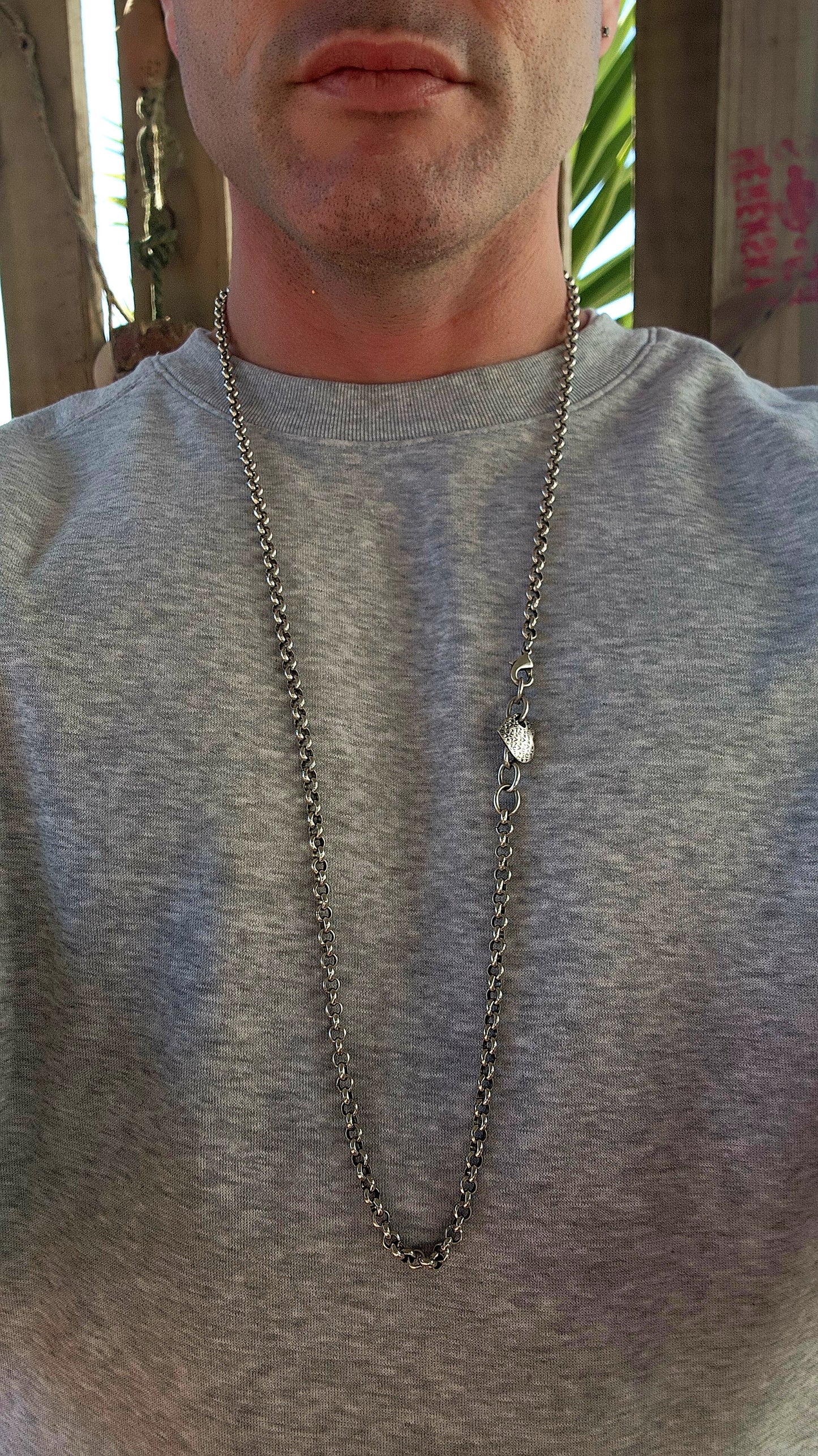 Up for grabs is this extra-length silver-plated rolo link necklace, an early creation by the renowned local designer Armilla.
