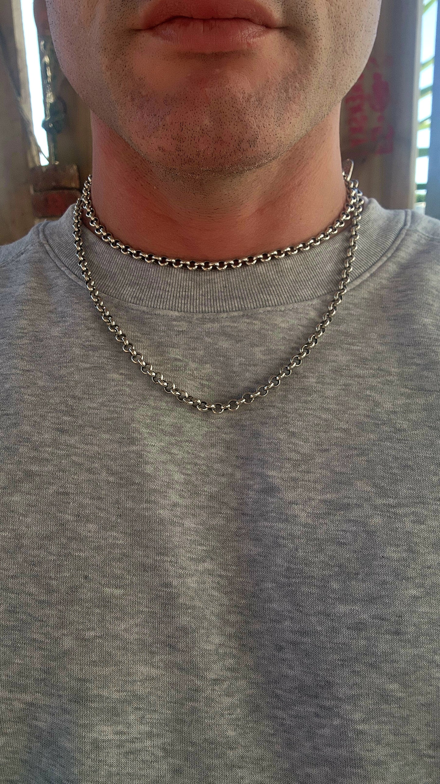 Up for grabs is this extra-length silver-plated rolo link necklace, an early creation by the renowned local designer Armilla.