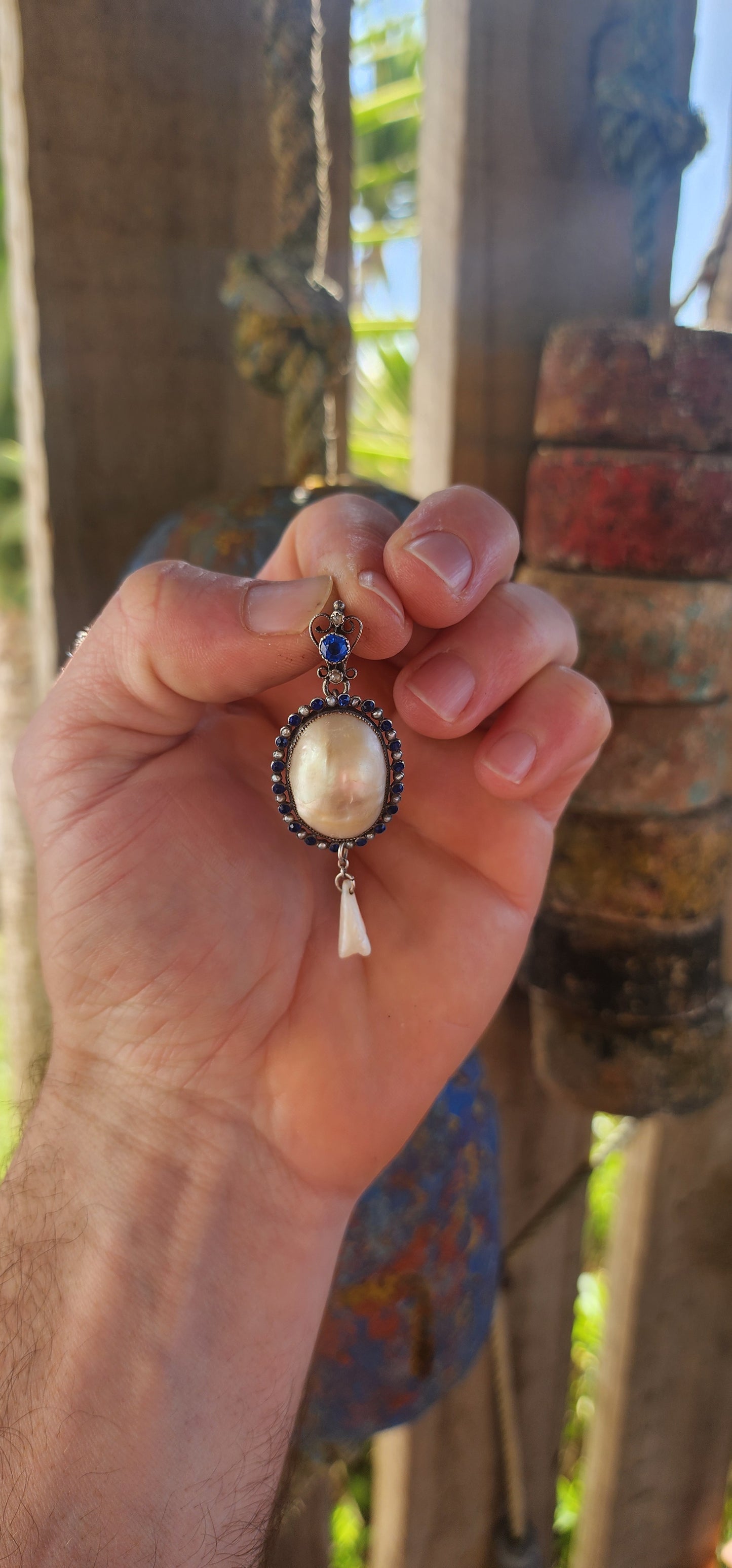 A breathtaking antique Art Nouveau / Jugendstil pendant dating to the early 1900s, exquisitely crafted in sterling silver with all the hallmarks of the romantic and nature-inspired design language that defined the period.