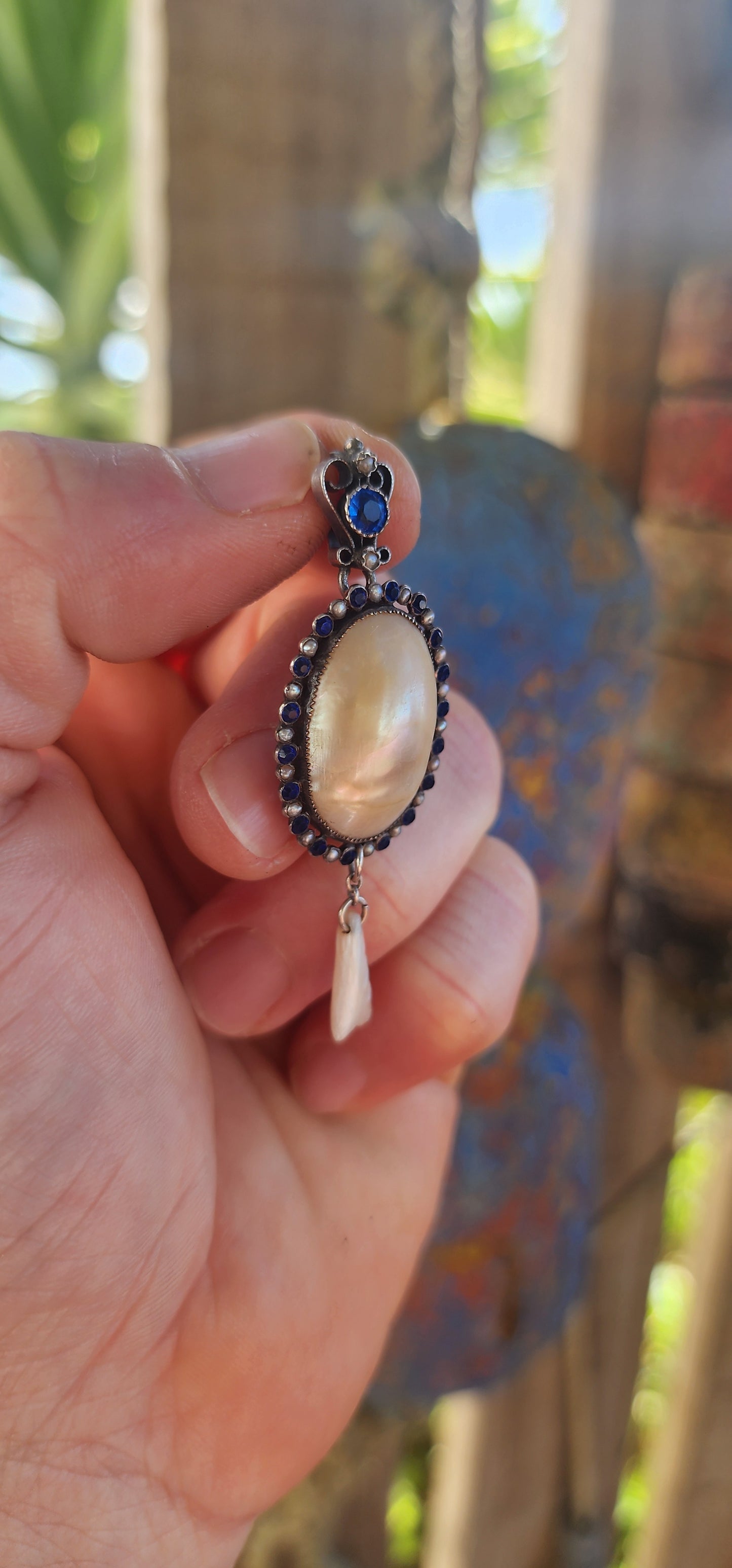 A breathtaking antique Art Nouveau / Jugendstil pendant dating to the early 1900s, exquisitely crafted in sterling silver with all the hallmarks of the romantic and nature-inspired design language that defined the period.