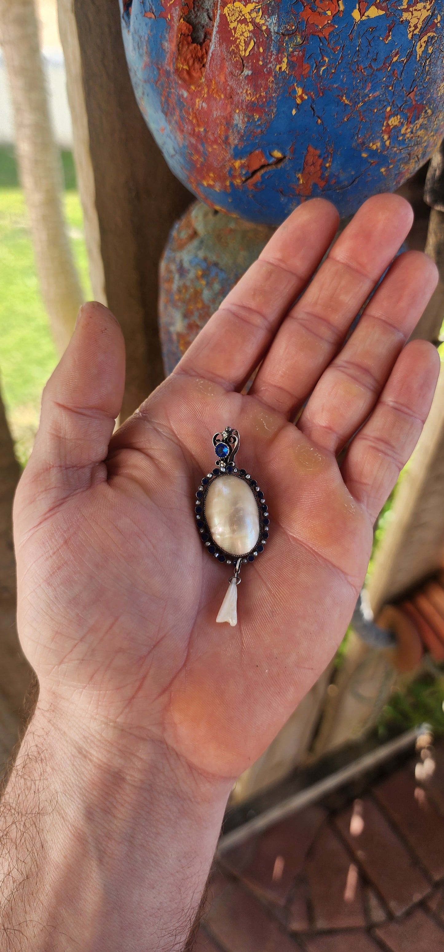 A breathtaking antique Art Nouveau / Jugendstil pendant dating to the early 1900s, exquisitely crafted in sterling silver with all the hallmarks of the romantic and nature-inspired design language that defined the period.