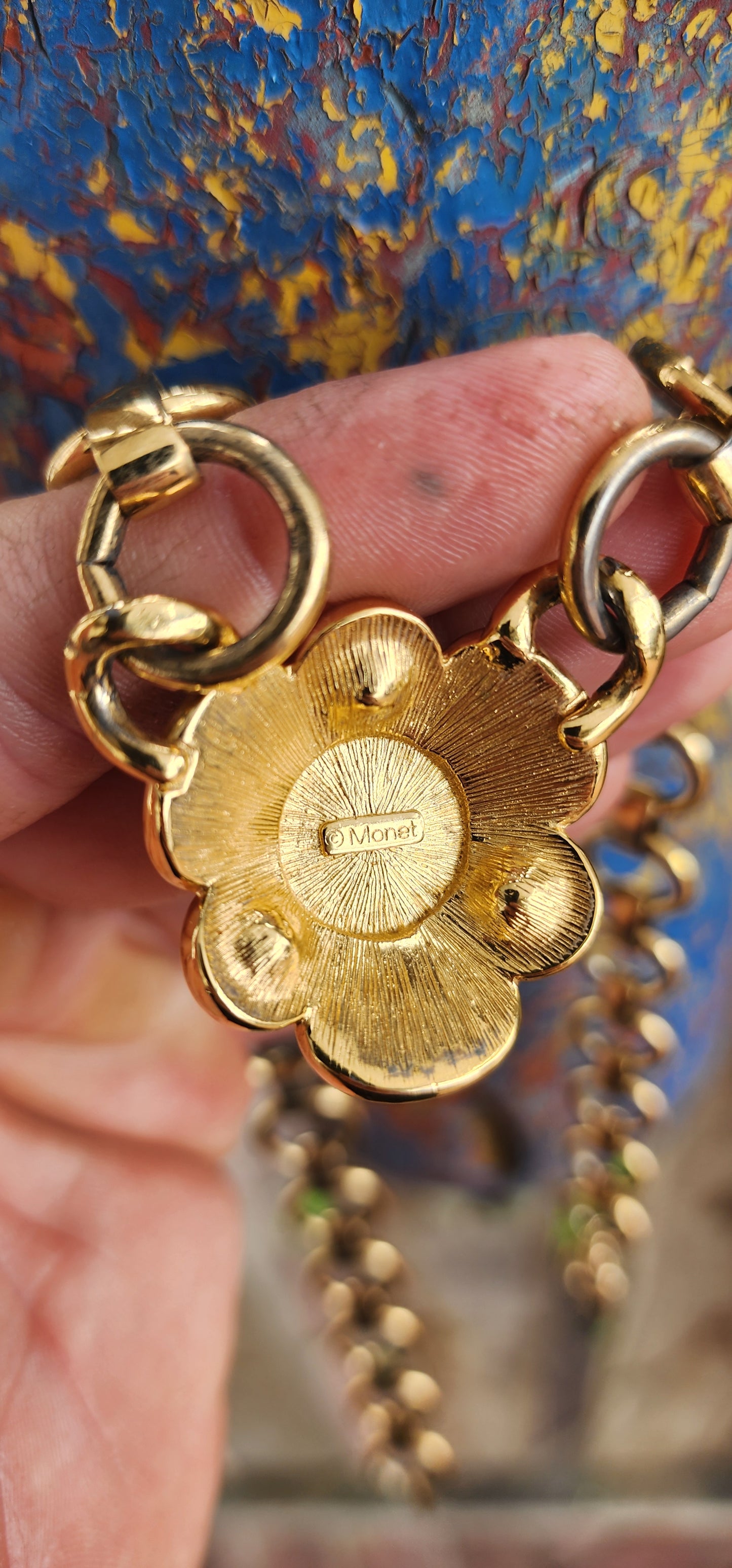 Vintage circa 1960s chunky designer costume necklace by Monet, the American jewelry house celebrated for its luxurious gold-plated finishes and mid-century glamour.