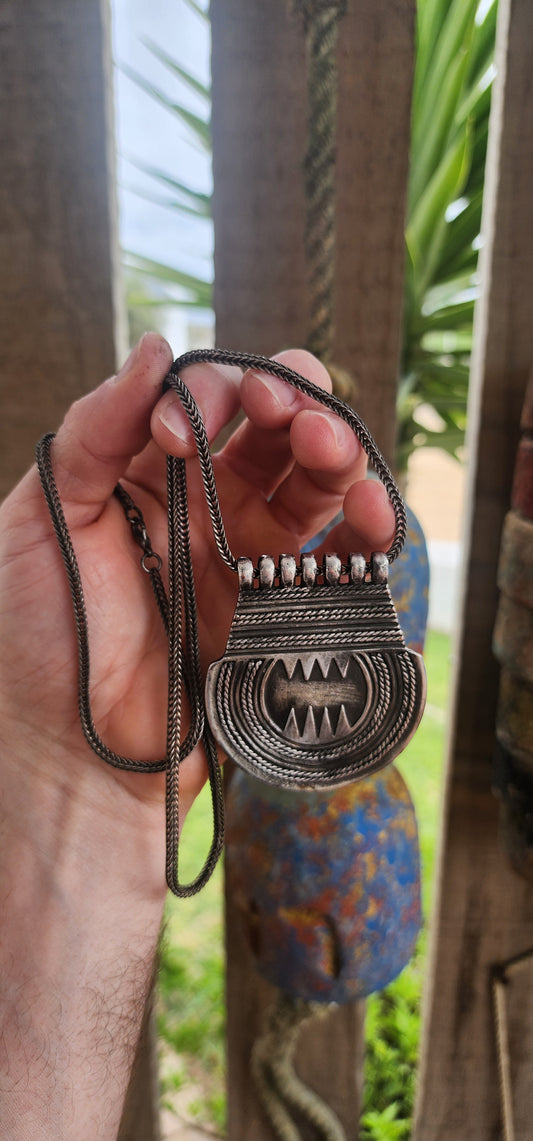 Marvelous vintage ethnic Saharan Berber Tuareg pendant necklace, exquisitely handcrafted in silver plate and suspended from an extra-length woven foxtail chain.