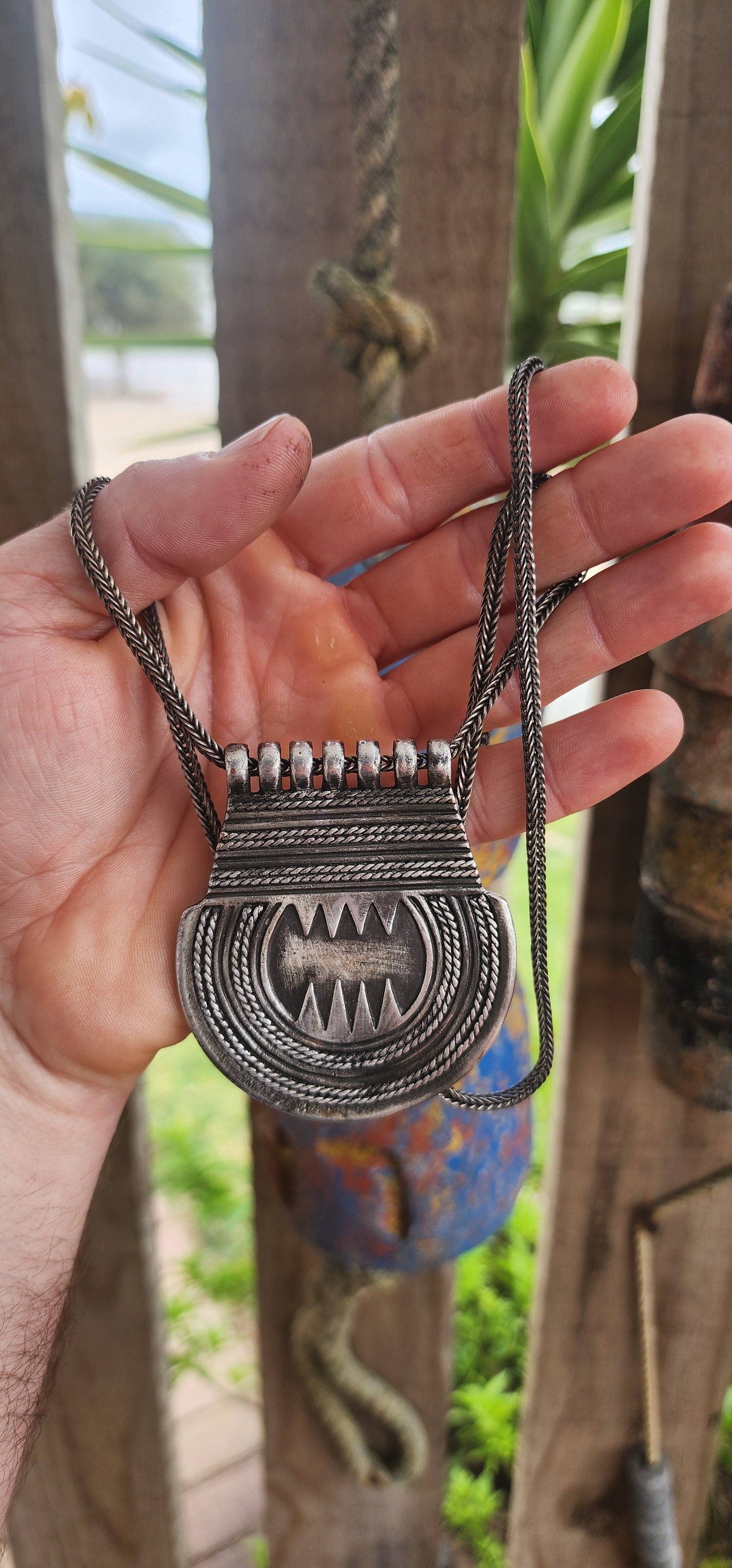 Marvelous vintage ethnic Saharan Berber Tuareg pendant necklace, exquisitely handcrafted in silver plate and suspended from an extra-length woven foxtail chain.