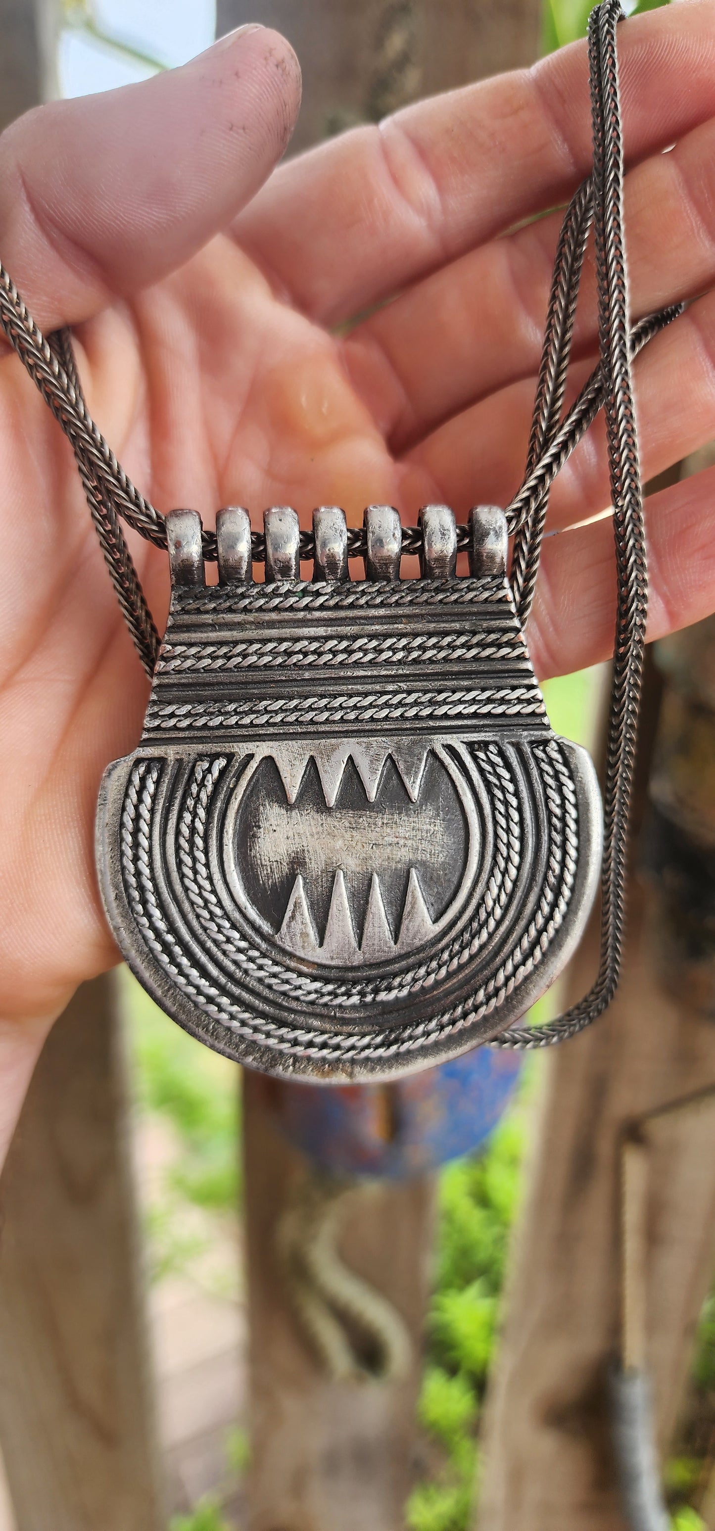 Marvelous vintage ethnic Saharan Berber Tuareg pendant necklace, exquisitely handcrafted in silver plate and suspended from an extra-length woven foxtail chain.