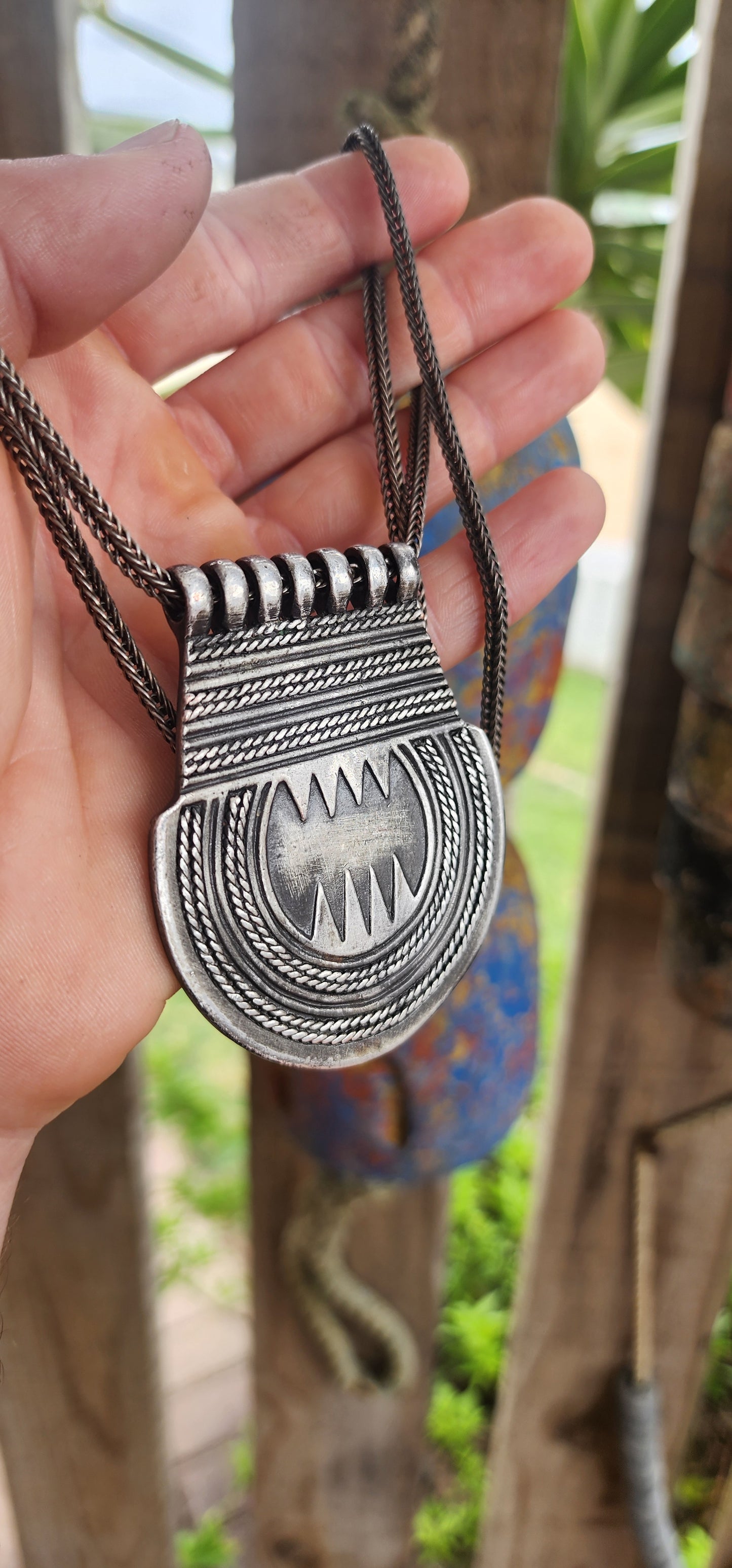 Marvelous vintage ethnic Saharan Berber Tuareg pendant necklace, exquisitely handcrafted in silver plate and suspended from an extra-length woven foxtail chain.
