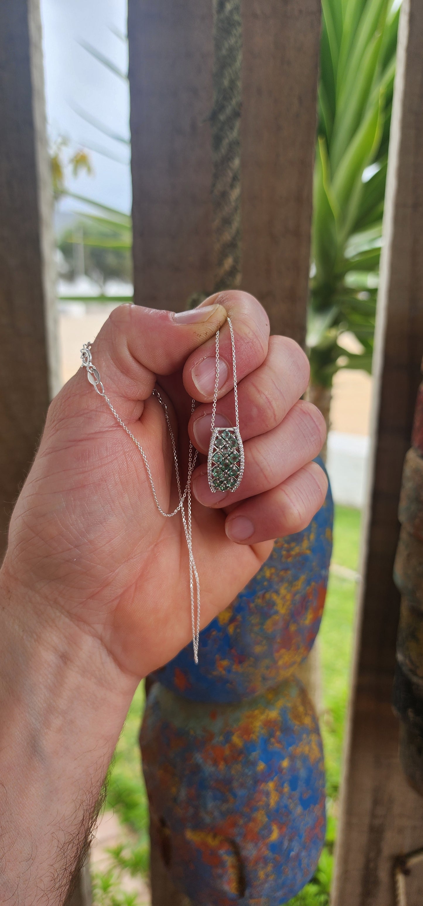 Exquisite Art Deco Revival sterling silver pendant on a fine, adjustable-length chain.