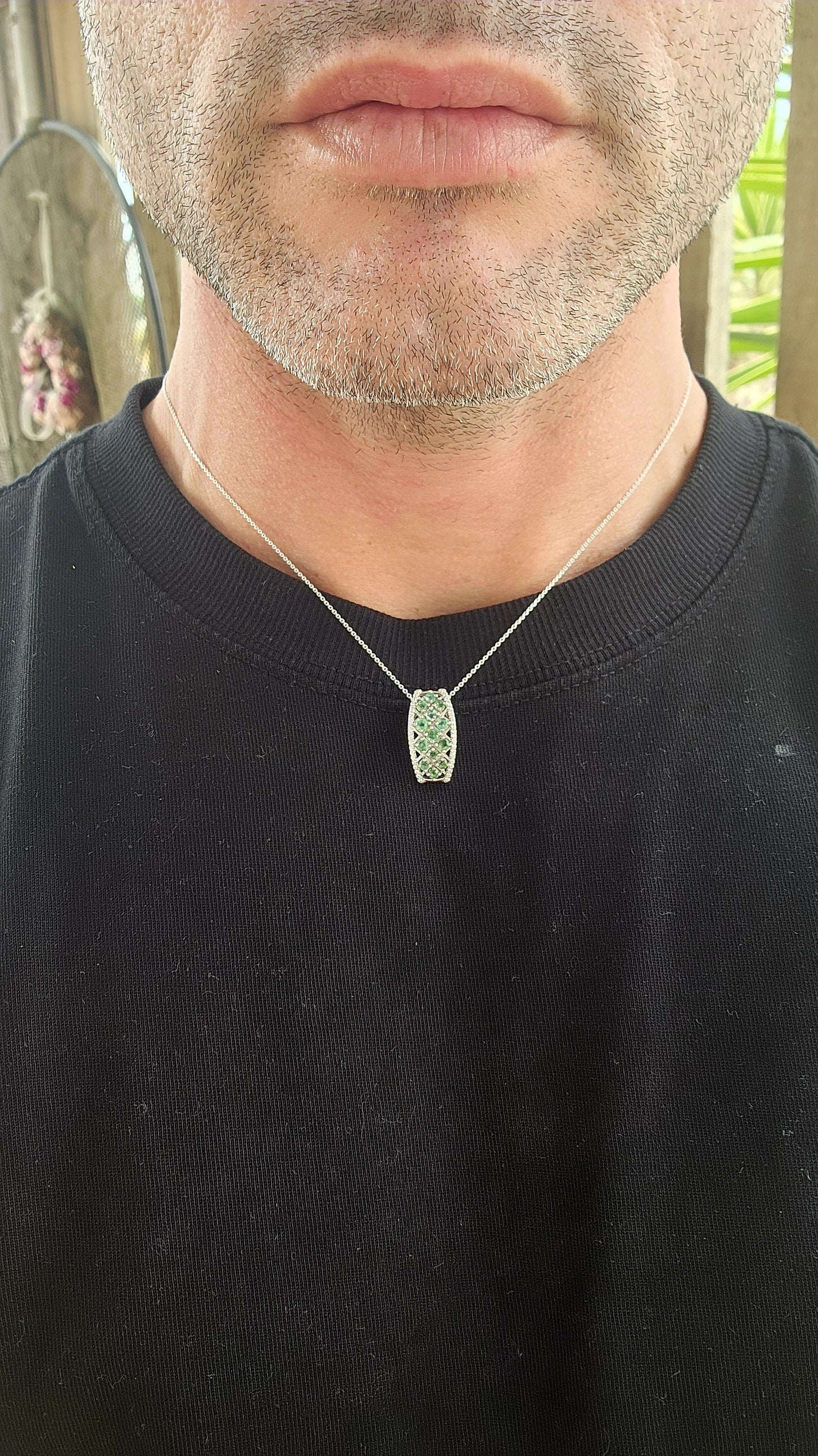 Exquisite Art Deco Revival sterling silver pendant on a fine, adjustable-length chain.