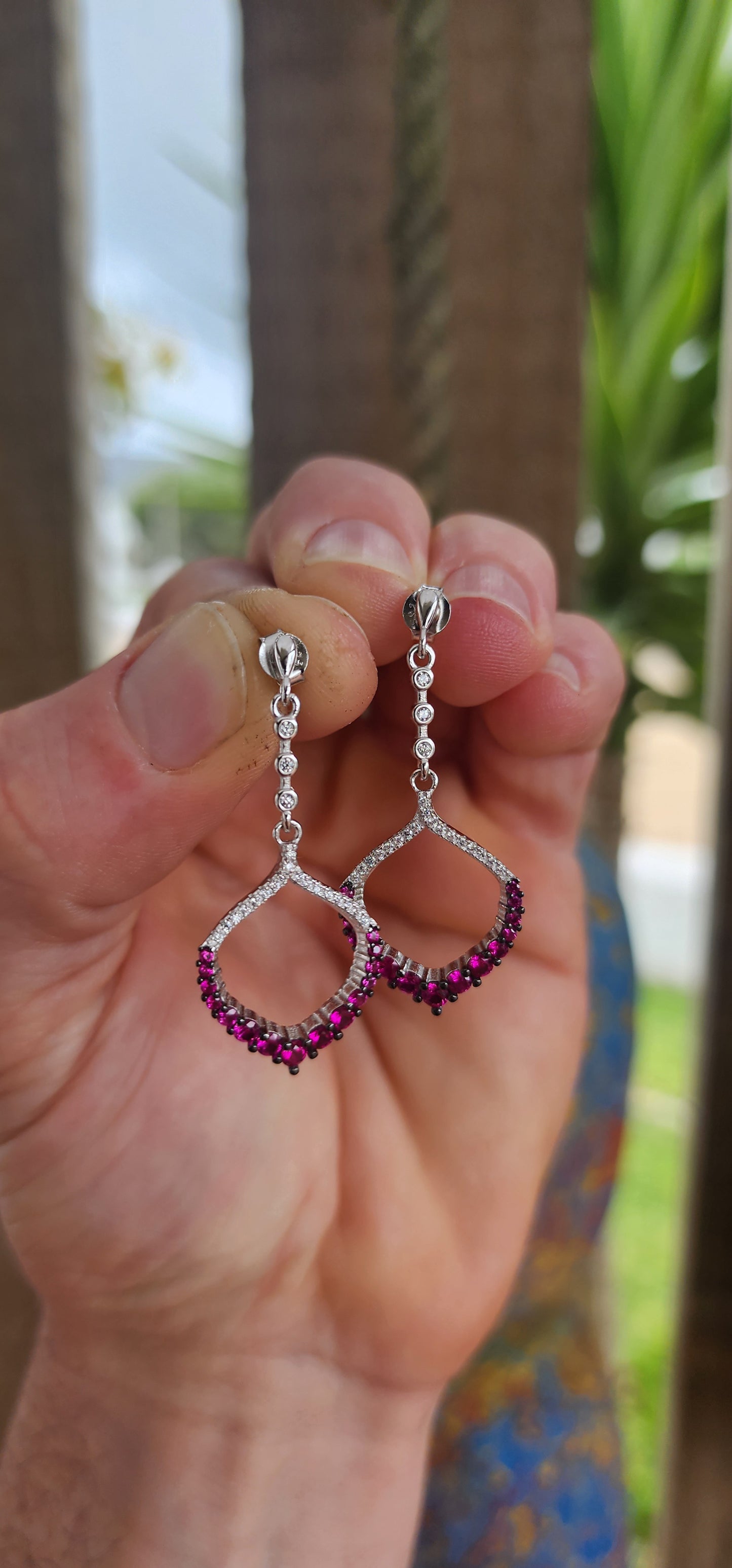 These dazzling drop earrings are where playful charm meets red carpet elegance.