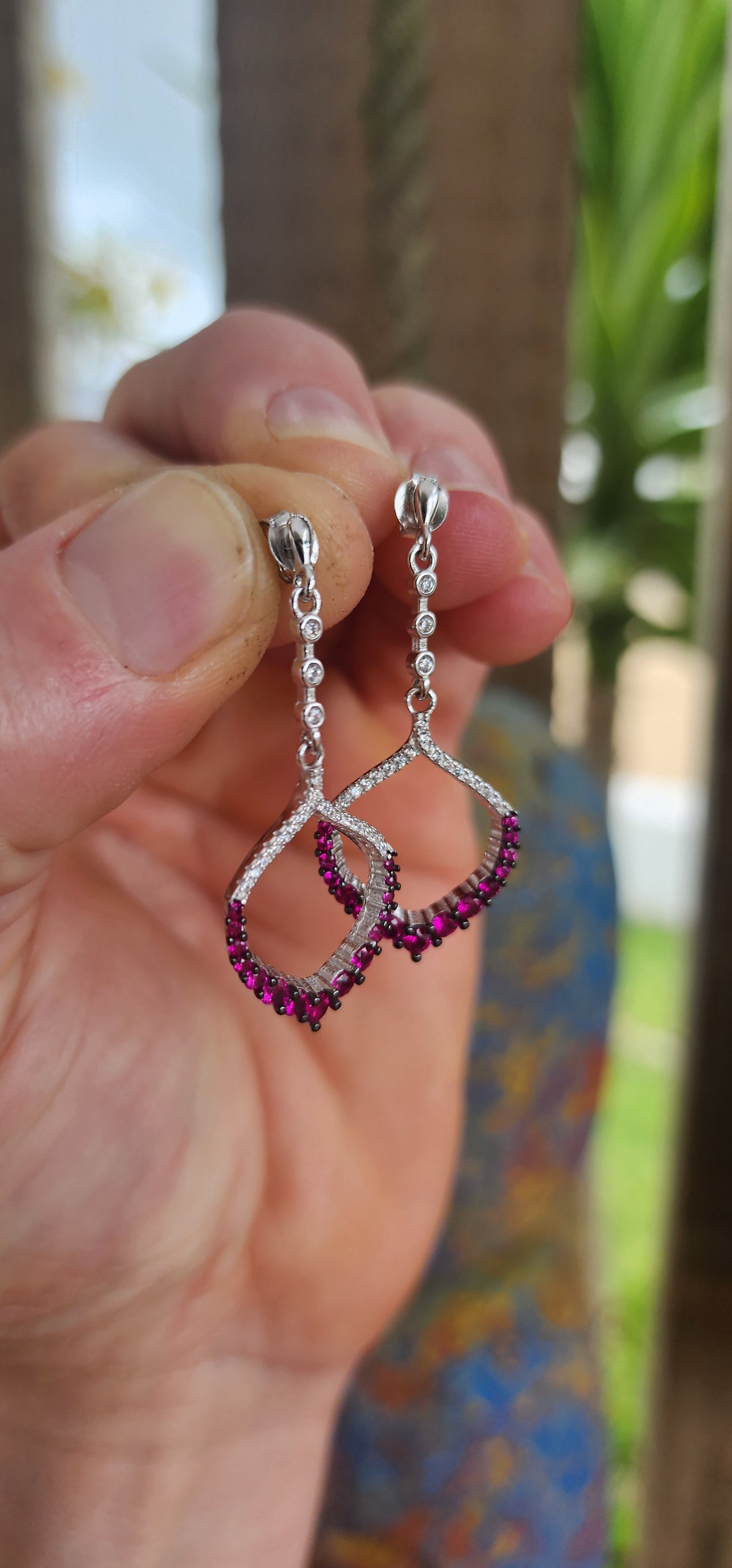 These dazzling drop earrings are where playful charm meets red carpet elegance.