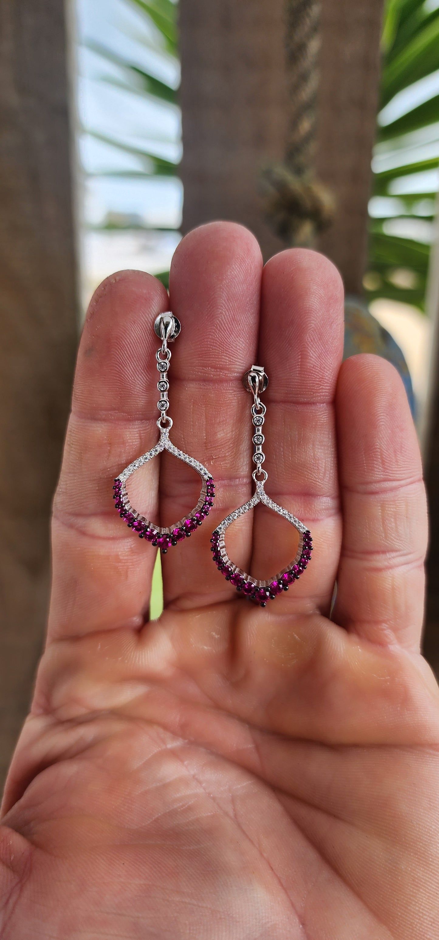 These dazzling drop earrings are where playful charm meets red carpet elegance.
