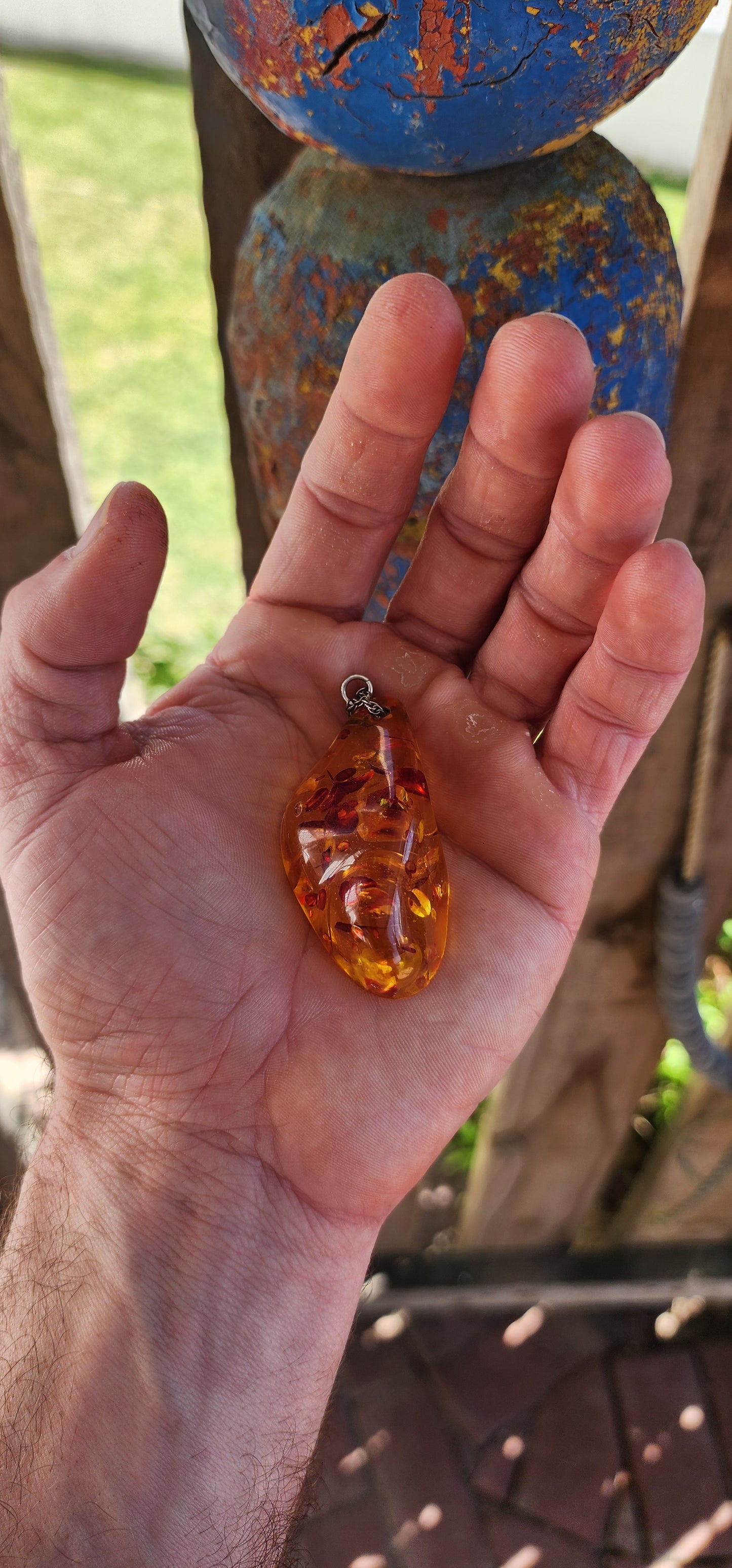 Magnificent and luminous, this large Baltic “piebald” amber pendant glows like captured sunlight!