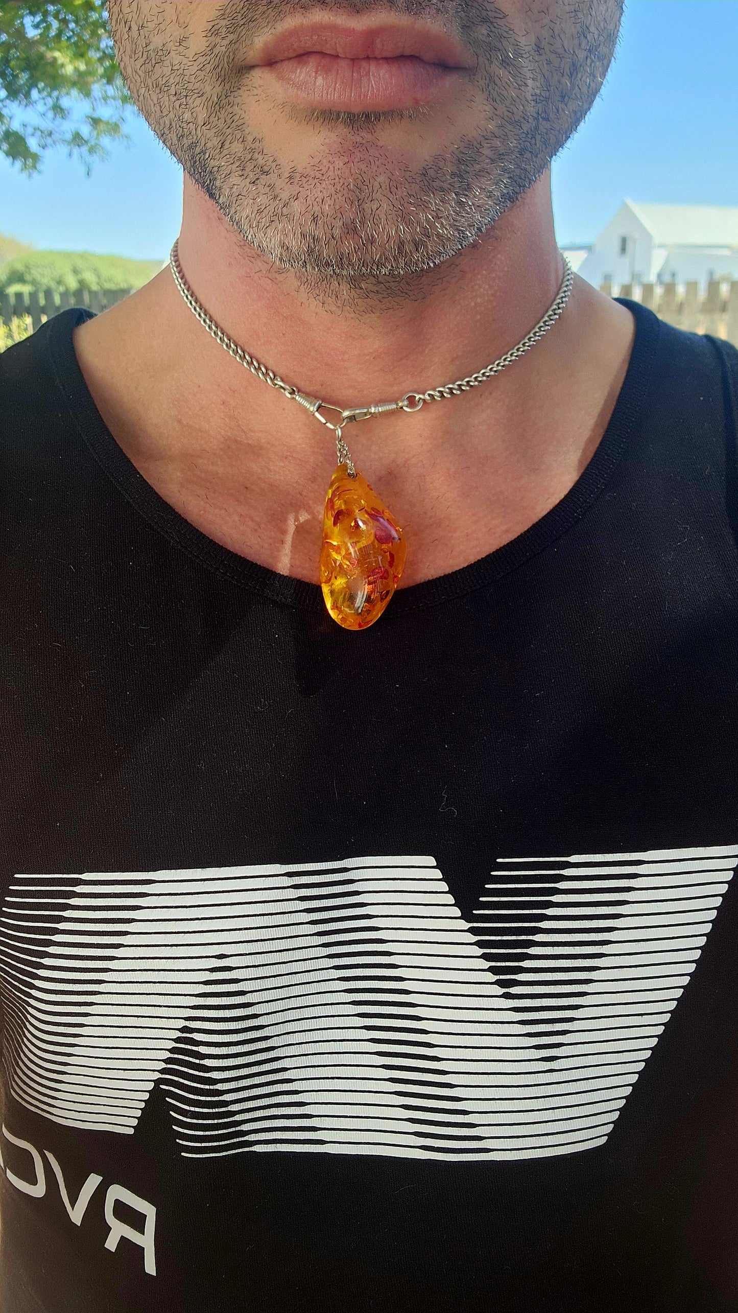 Magnificent and luminous, this large Baltic “piebald” amber pendant glows like captured sunlight!