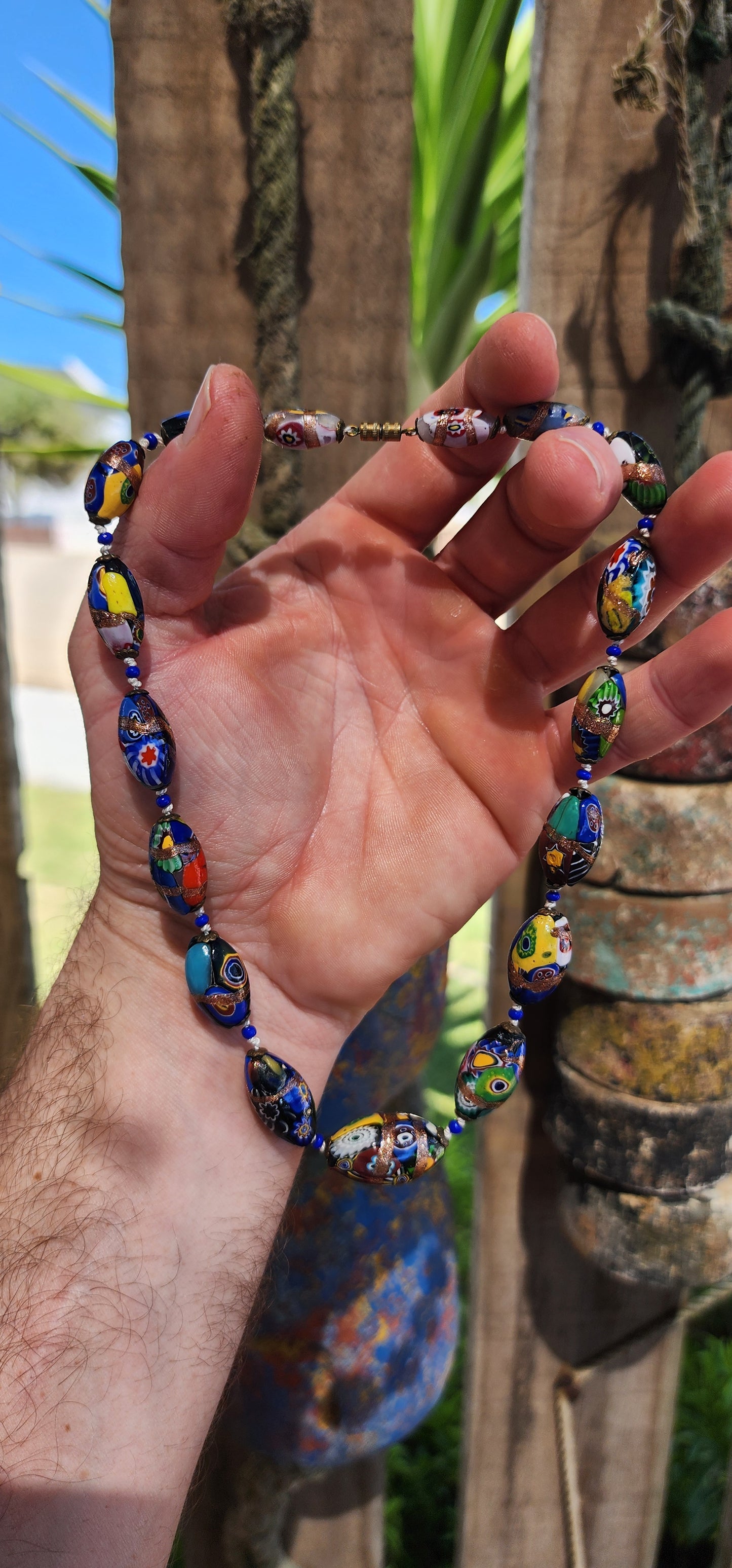 An extraordinary vintage art deco era Venetian Murano Millefiori glass choker necklace, bursting with color, craftsmanship, and old-world charm.