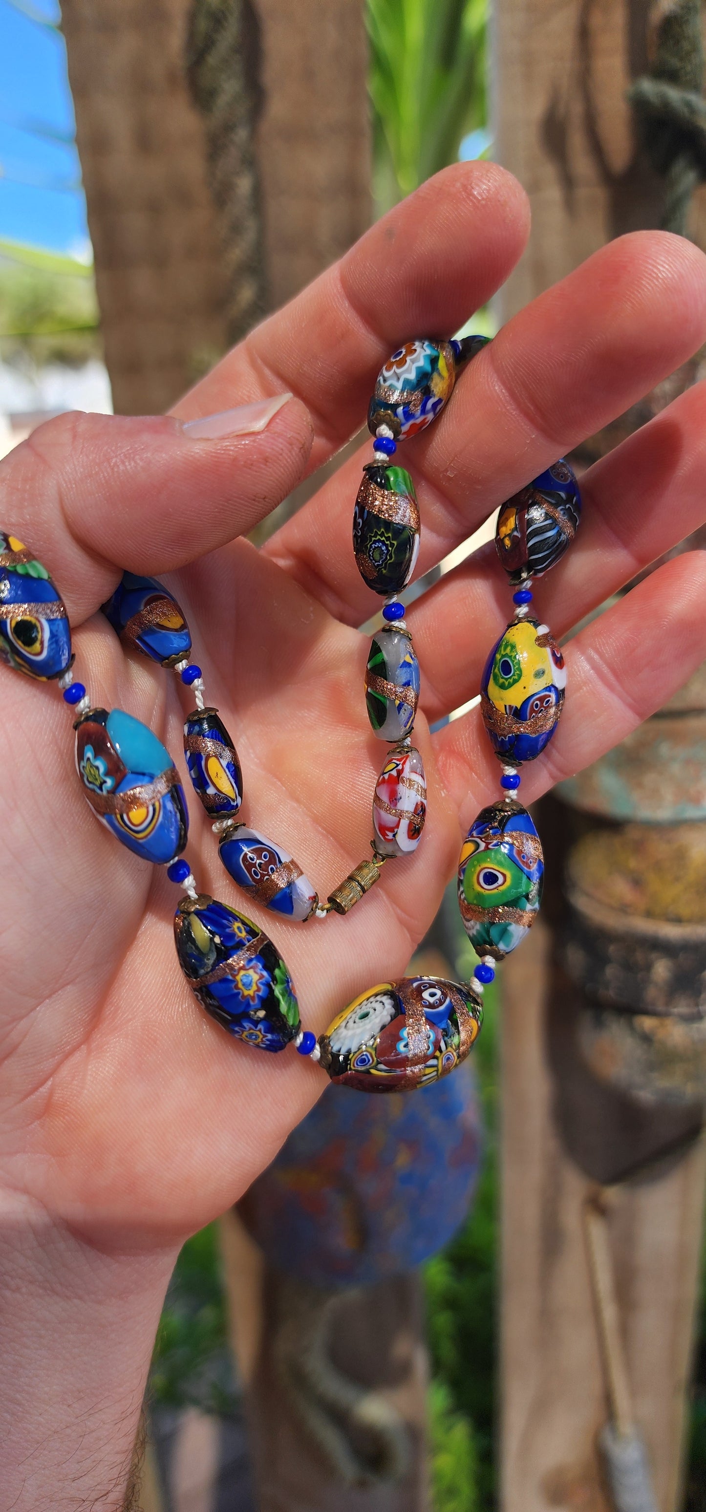 An extraordinary vintage art deco era Venetian Murano Millefiori glass choker necklace, bursting with color, craftsmanship, and old-world charm.