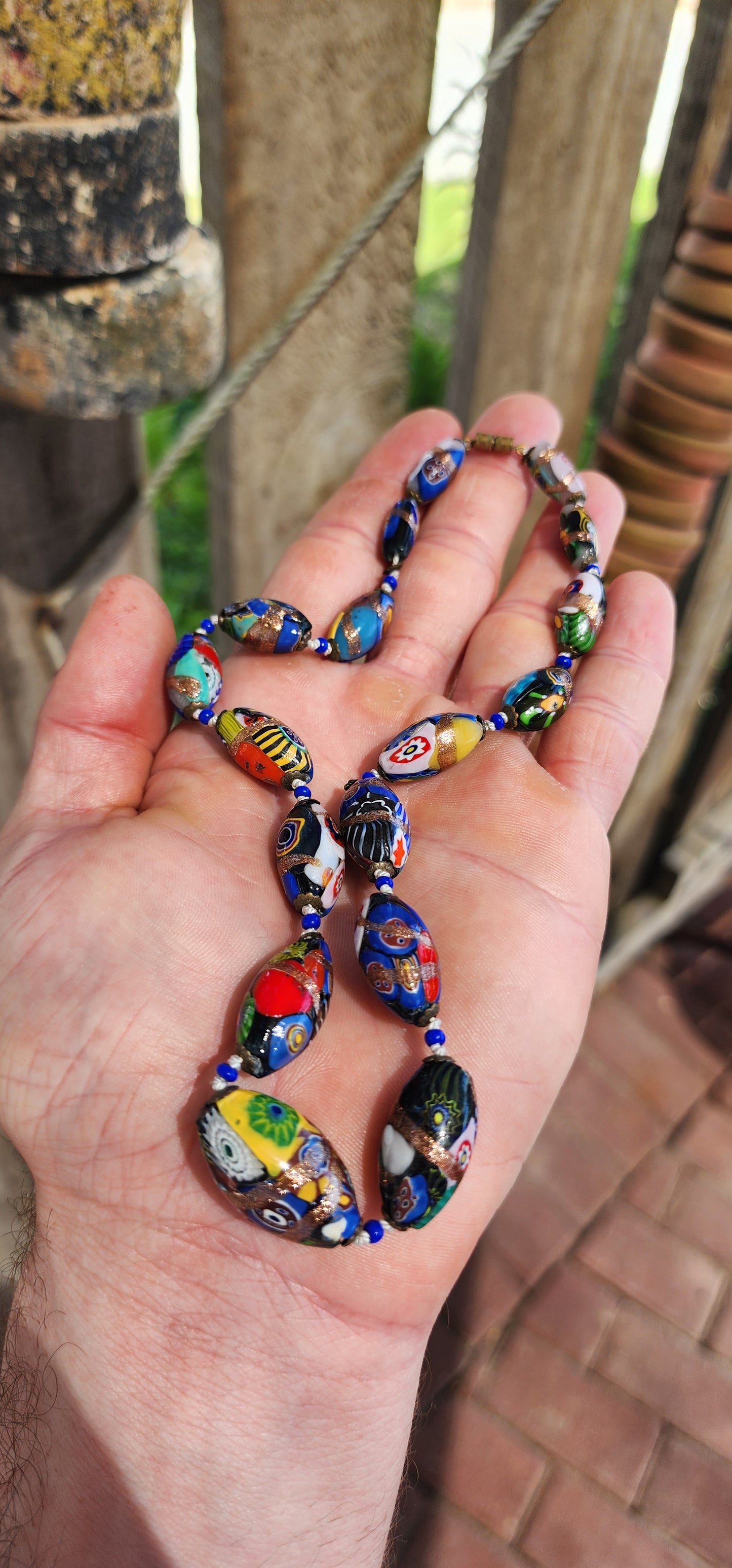 An extraordinary vintage art deco era Venetian Murano Millefiori glass choker necklace, bursting with color, craftsmanship, and old-world charm.