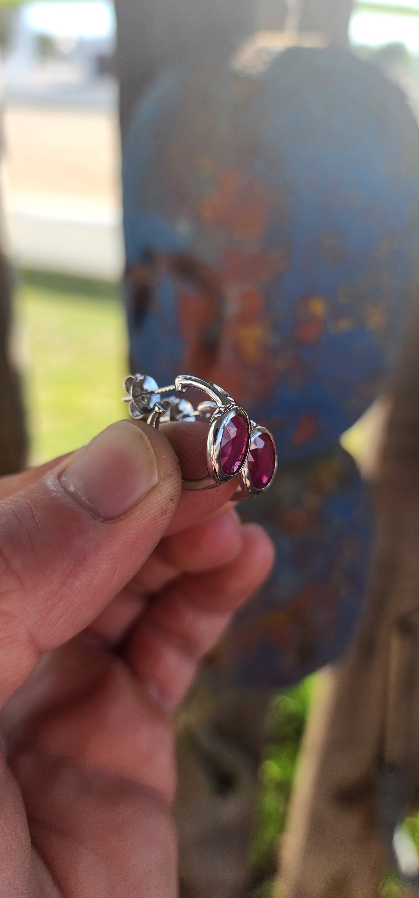 Bold, elegant, and effortlessly refined — this modernist pair of sterling silver half-hoop stud earrings commands attention with their minimalist geometry and rich color.