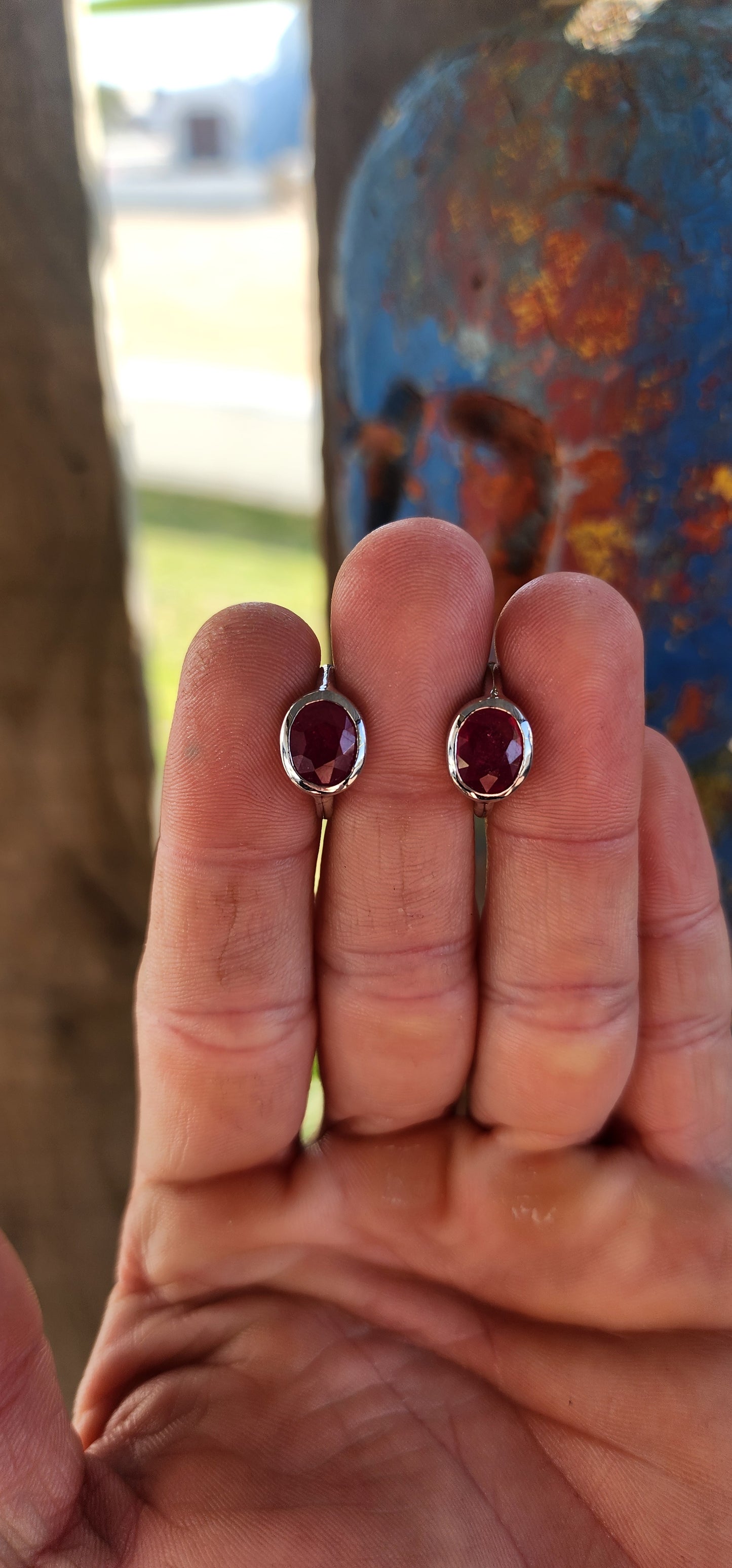 Bold, elegant, and effortlessly refined — this modernist pair of sterling silver half-hoop stud earrings commands attention with their minimalist geometry and rich color.