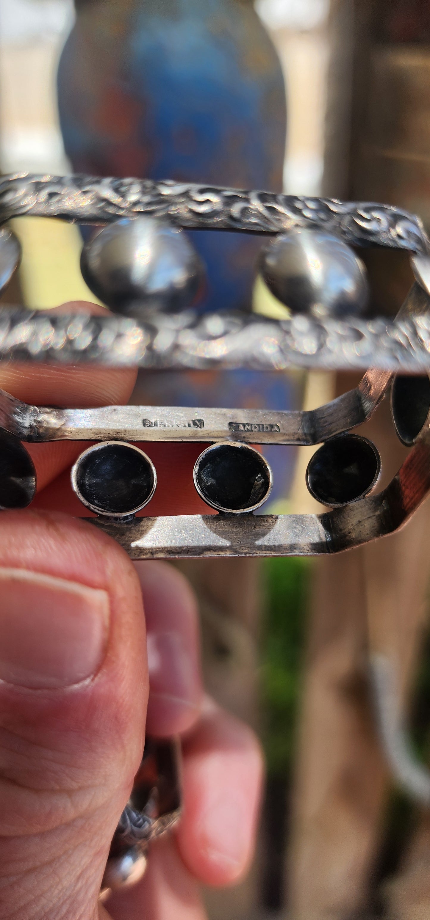 A beautifully matched pair of vintage sterling silver napkin rings by the highly sought-after South African silversmith Joe Calafato, working under his renowned studio name Candida.