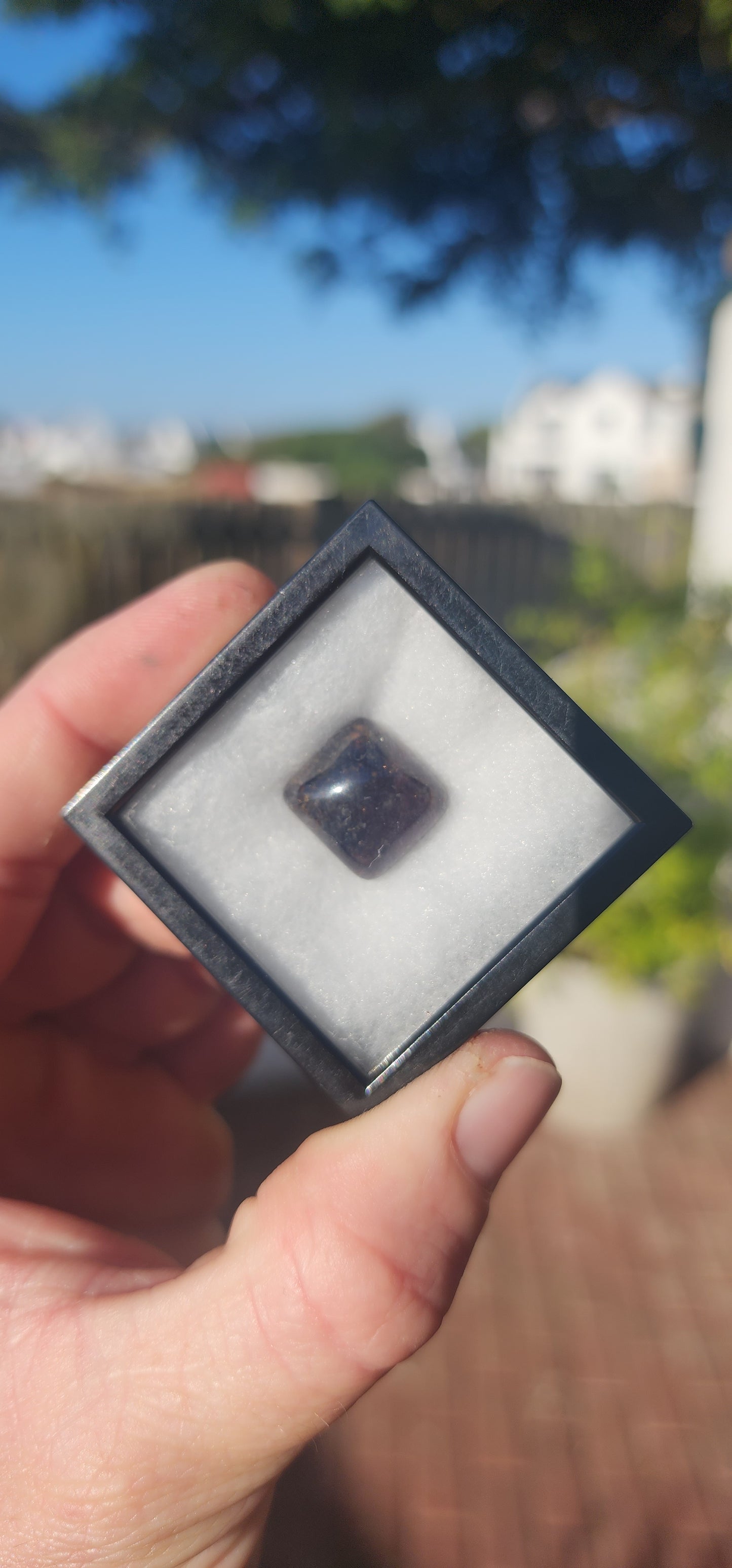 Behold this generous, dark burnt-orange tourmaline cabochon, masterfully shaped in the coveted sugar-loaf cut—a style treasured since ancient times for its softly domed peak and rounded geometric form.