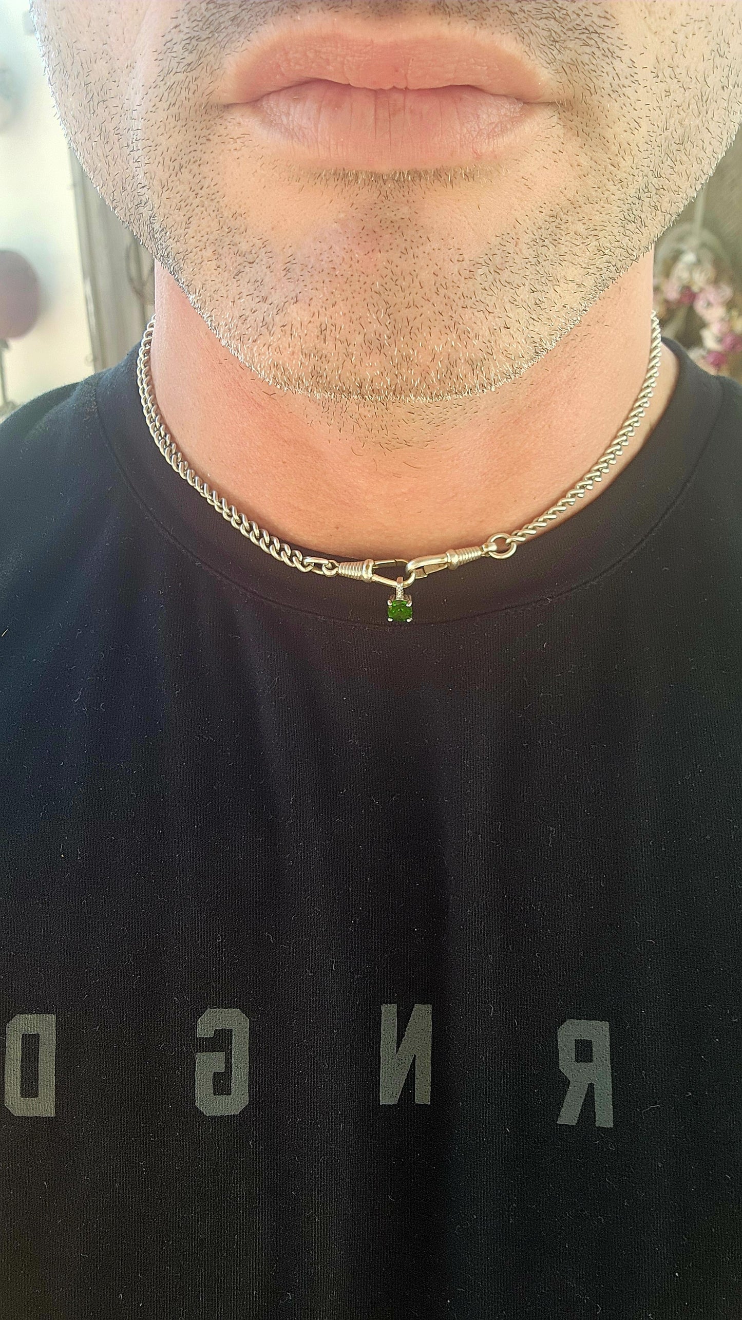 Small in size, MASSIVE in impact!
This elegant sterling silver Tsavorite pendant.