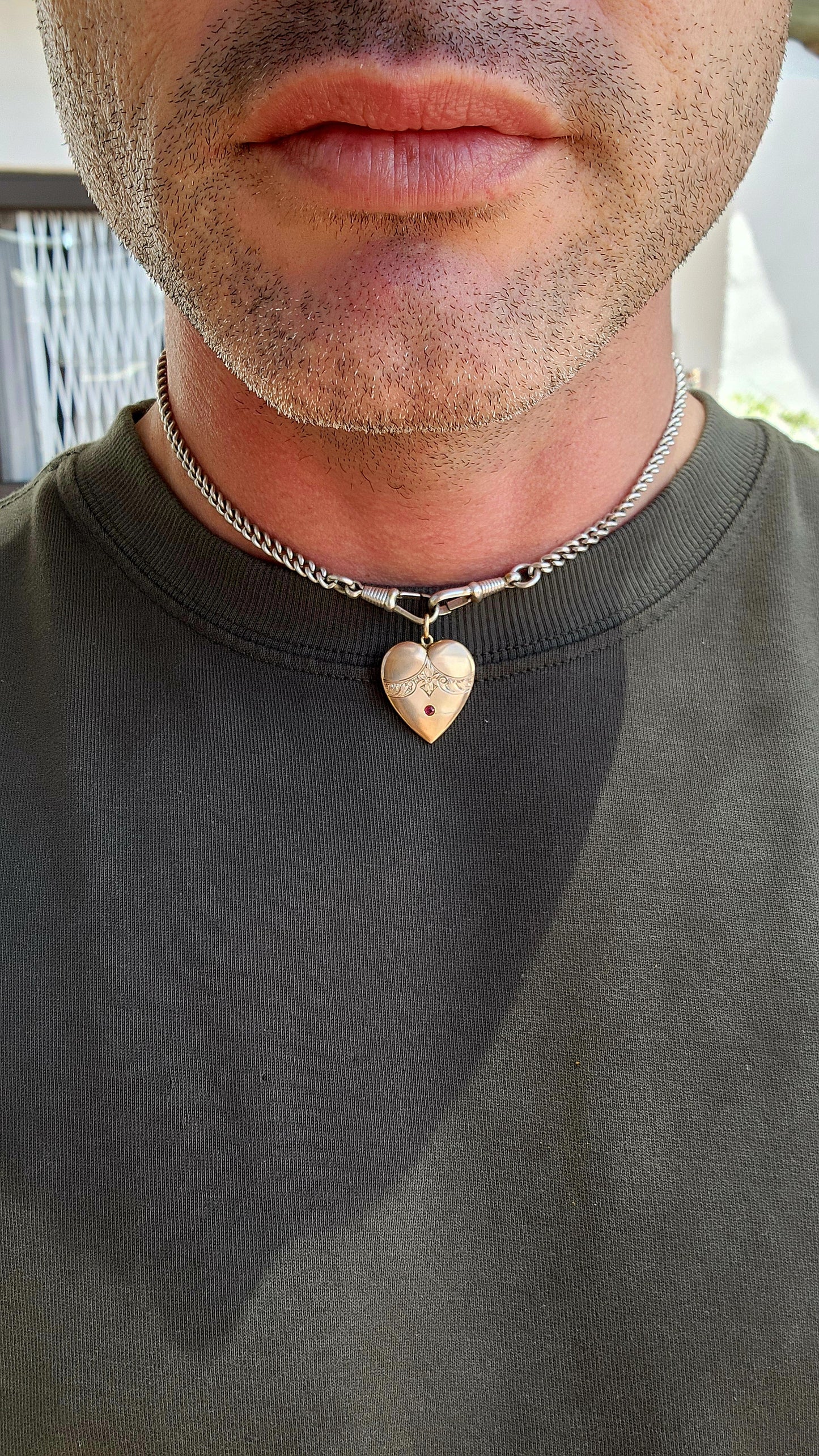 A truly breathtaking treasure from the romantic Edwardian era, this antique circa 1900 puffed heart pendant has survived more than 120 years with its beauty, grace, and symbolism entirely intact.