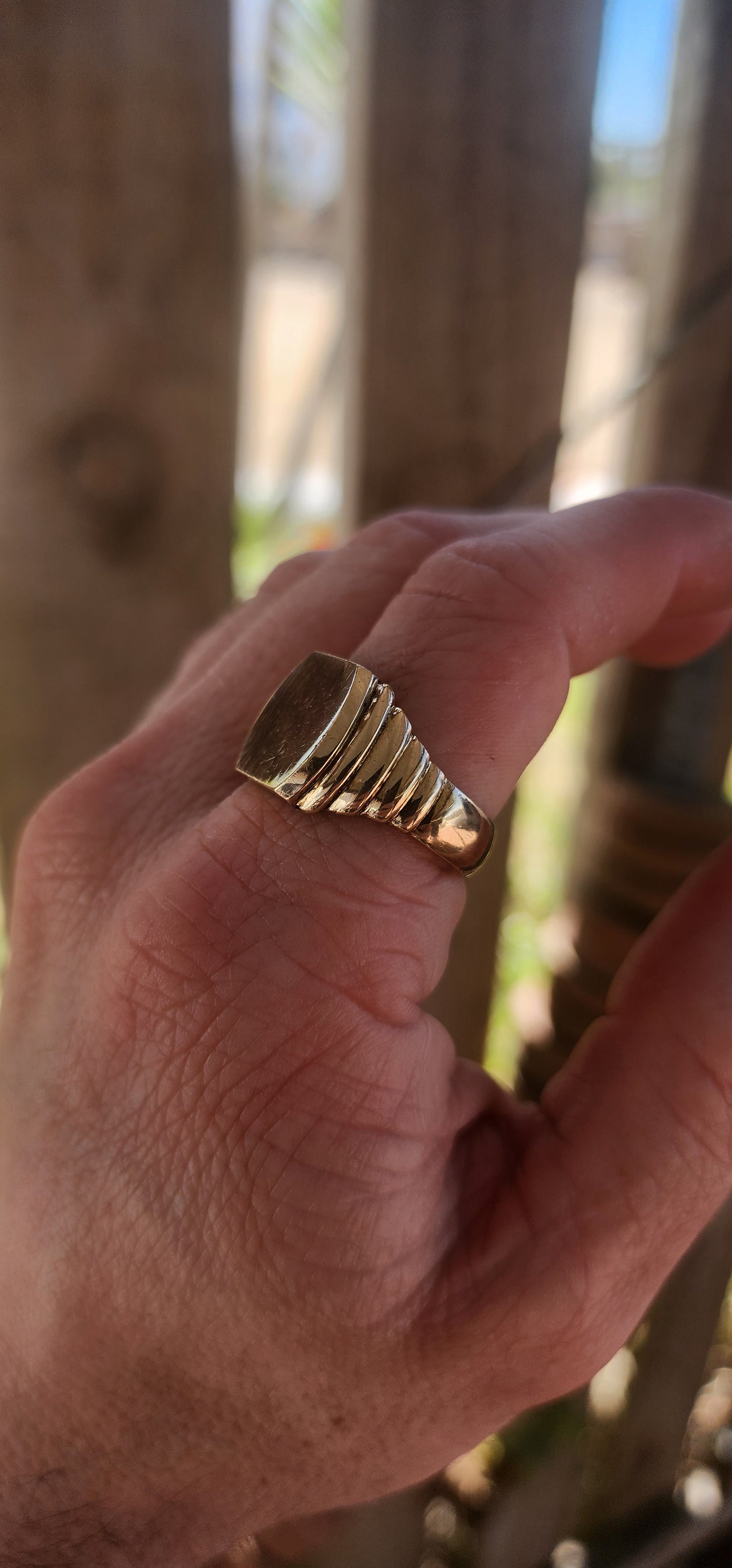Chunky vintage men’s signet ring, masterfully crafted in a rich golden brass, carrying serious presence and personality.